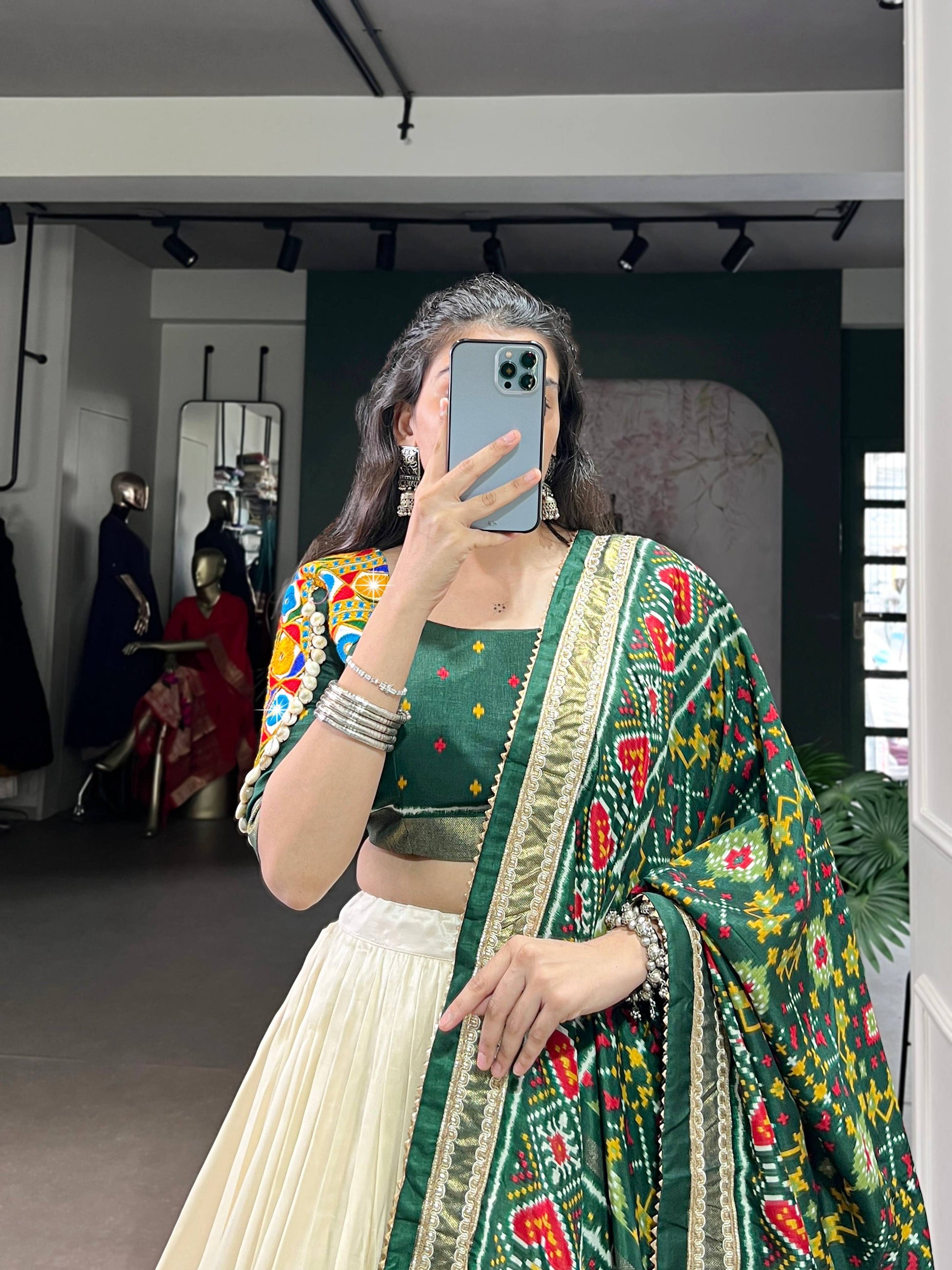 Lorenvalley Fashion Offwhite Tasar Silk Patola Print With Foil Work And Real Mirror Gamthi Work With Lace Touch Up Lehenga Choli with Dupatta | Swadesiicart