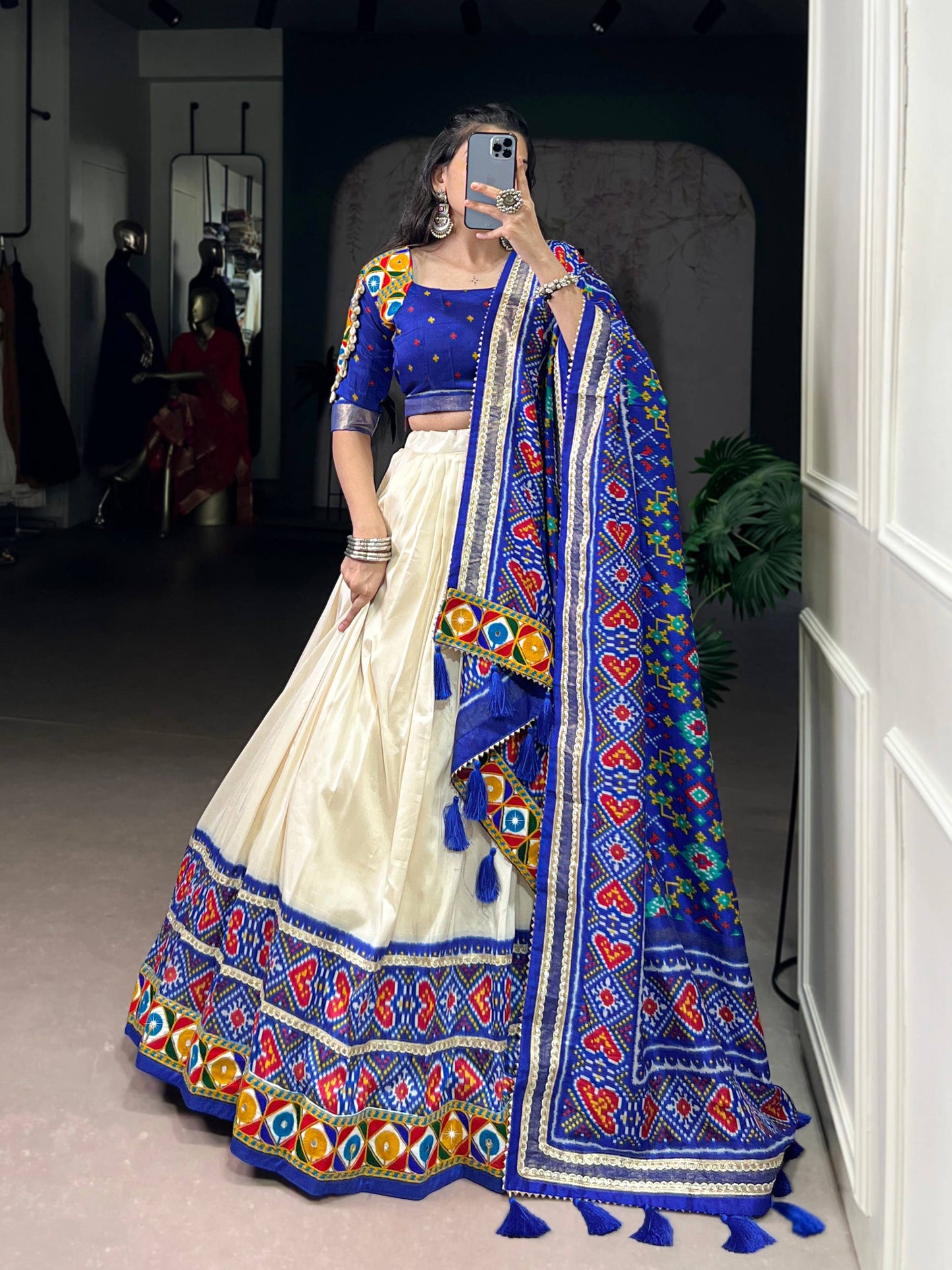 Lorenvalley Fashion Offwhite Tasar Silk Patola Print With Foil Work And Real Mirror Gamthi Work With Lace Touch Up Lehenga Choli with Dupatta | Swadesiicart