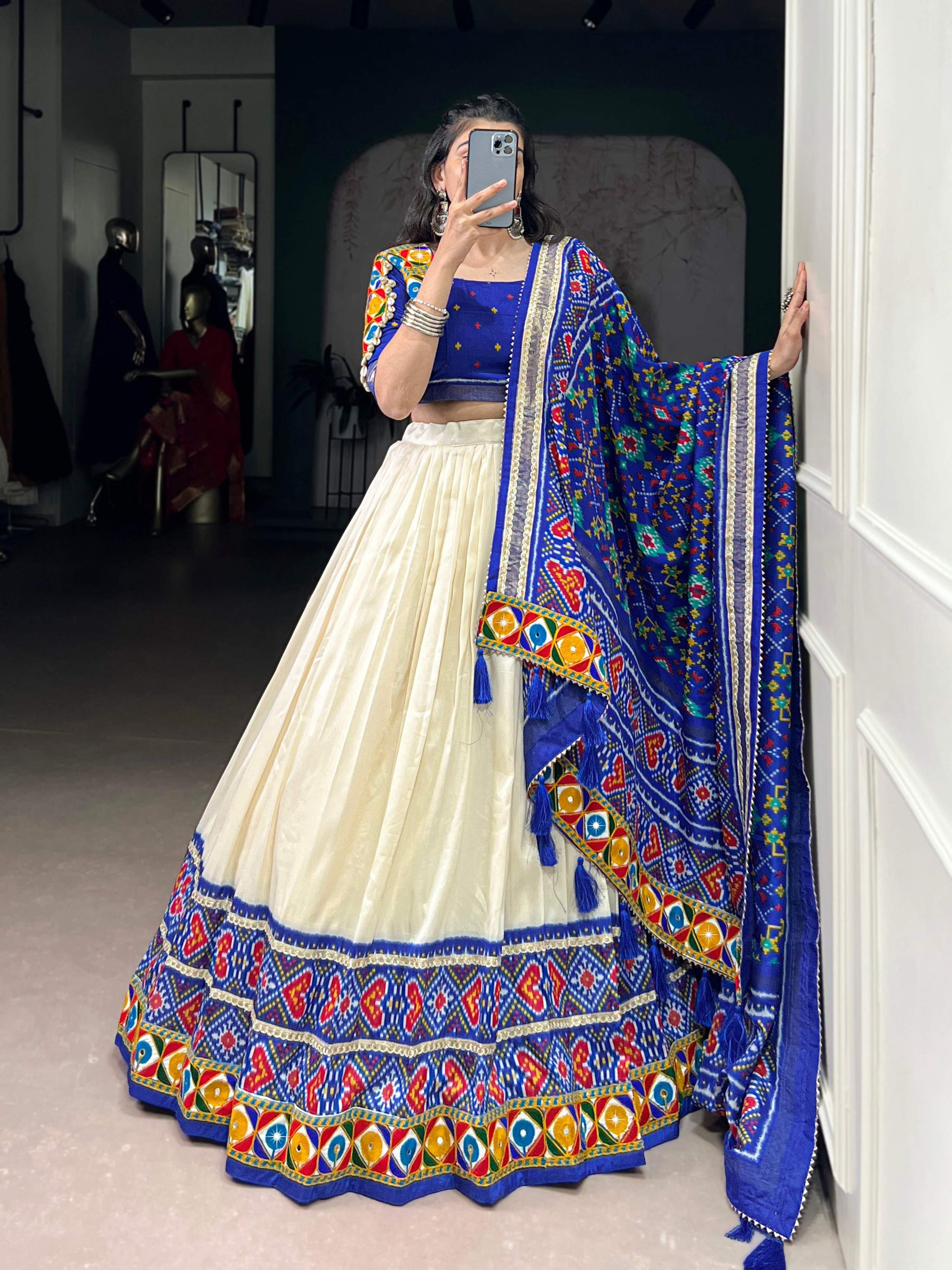 Lorenvalley Fashion Offwhite Tasar Silk Patola Print With Foil Work And Real Mirror Gamthi Work With Lace Touch Up Lehenga Choli with Dupatta | Swadesiicart
