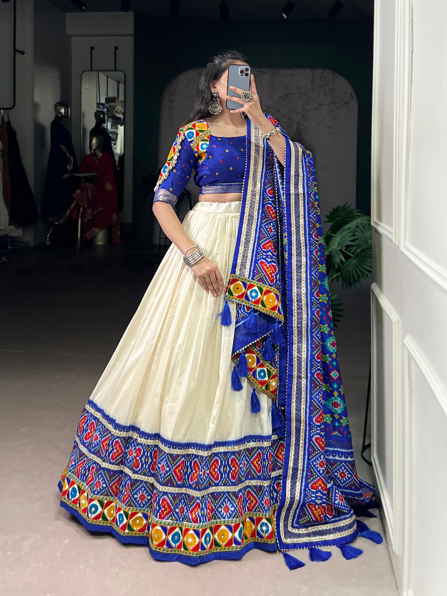 Lorenvalley Fashion Offwhite Tasar Silk Patola Print With Foil Work And Real Mirror Gamthi Work With Lace Touch Up Lehenga Choli with Dupatta | Swadesiicart
