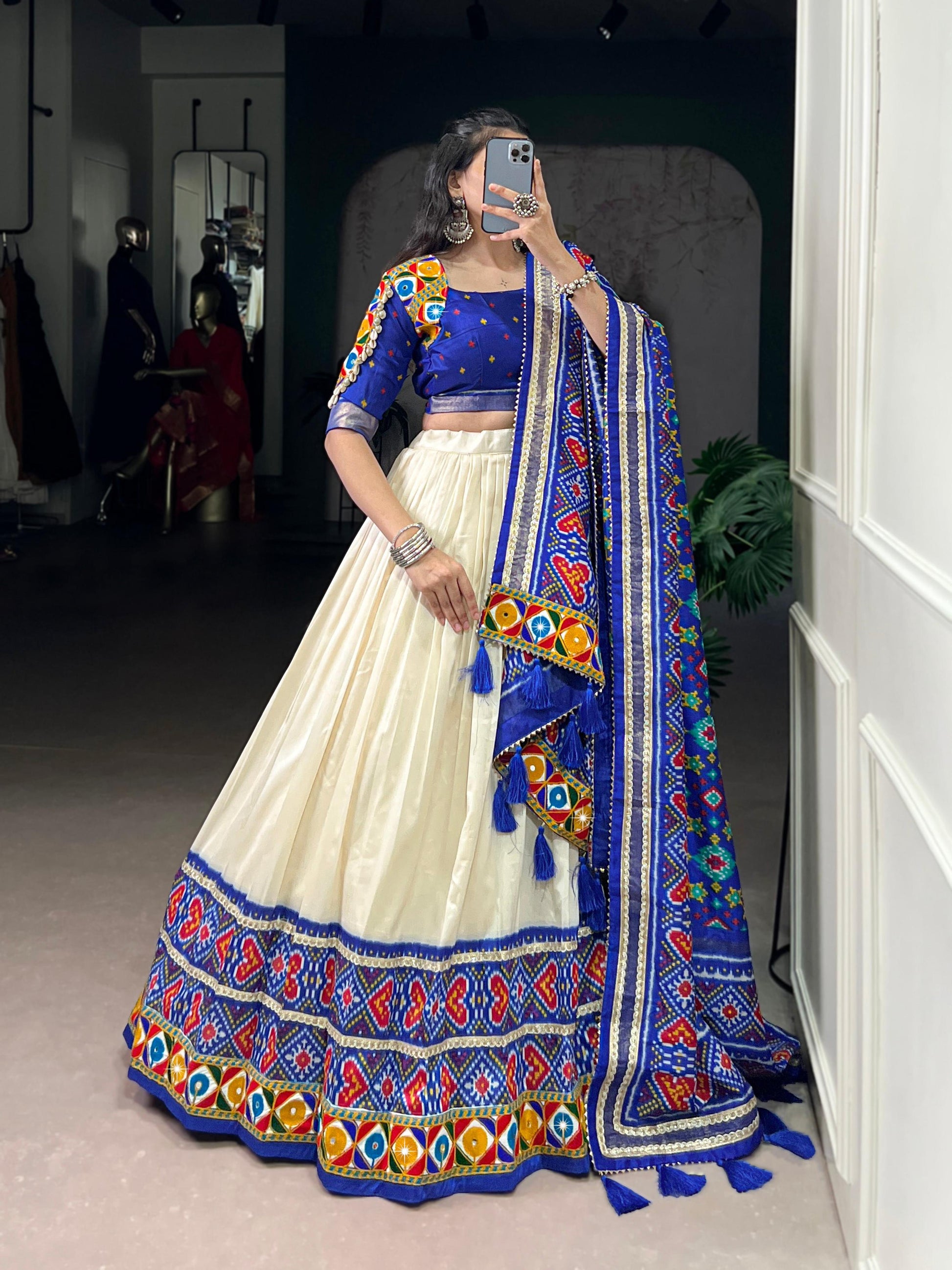 Lorenvalley Fashion Offwhite Tasar Silk Patola Print With Foil Work And Real Mirror Gamthi Work With Lace Touch Up Lehenga Choli with Dupatta | Swadesiicart