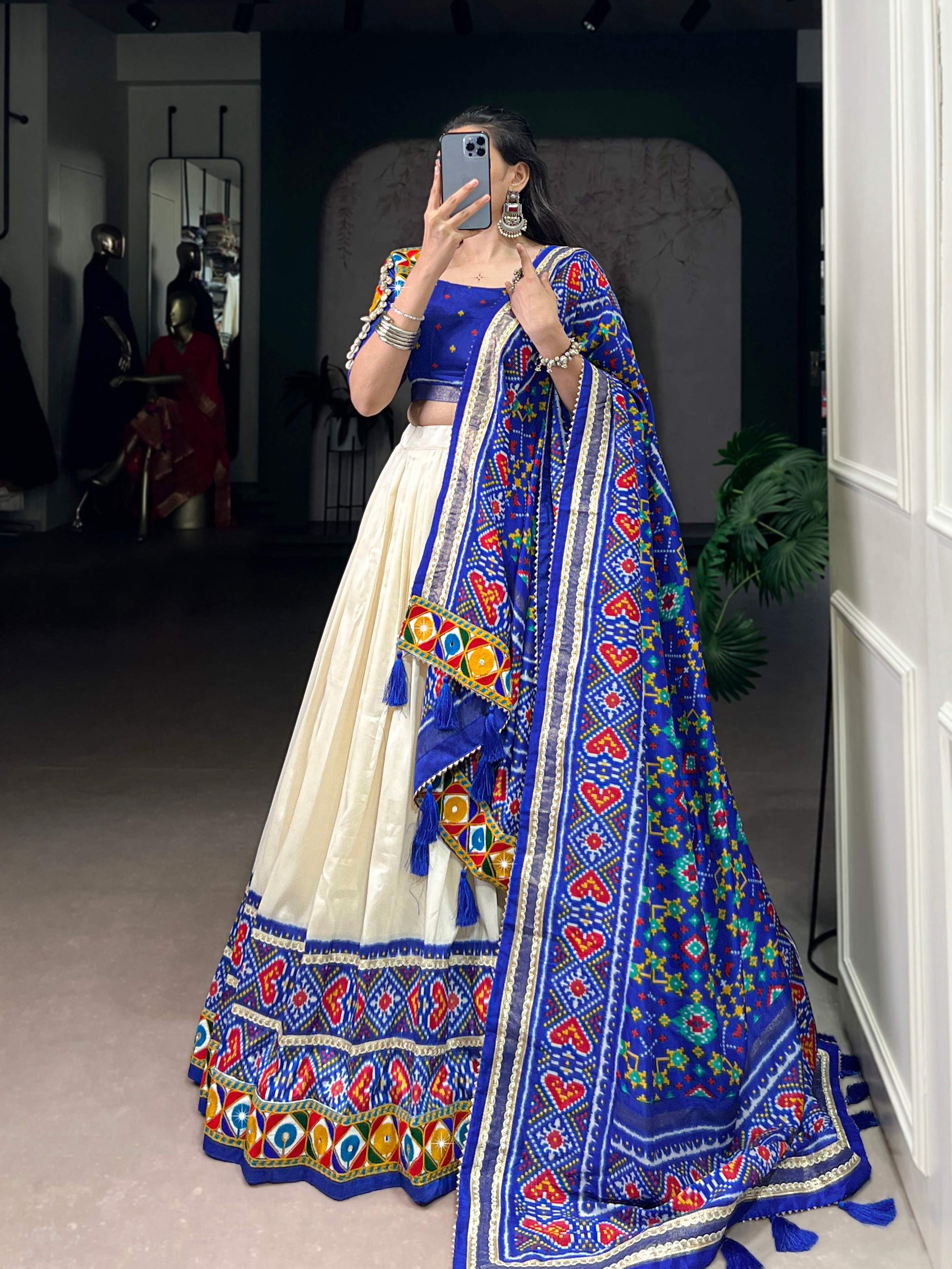 Lorenvalley Fashion Offwhite Tasar Silk Patola Print With Foil Work And Real Mirror Gamthi Work With Lace Touch Up Lehenga Choli with Dupatta | Swadesiicart