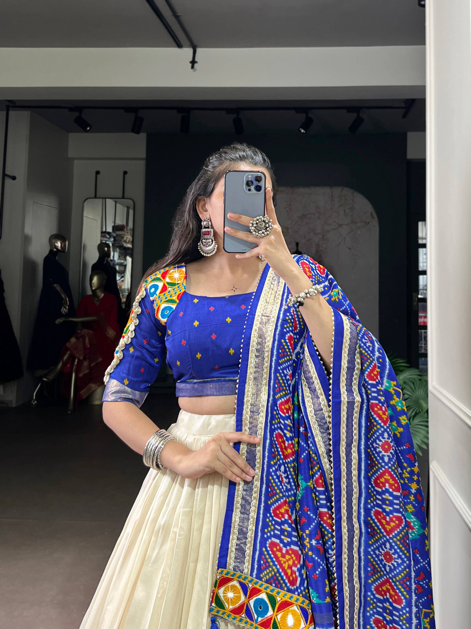Lorenvalley Fashion Offwhite Tasar Silk Patola Print With Foil Work And Real Mirror Gamthi Work With Lace Touch Up Lehenga Choli with Dupatta | Swadesiicart