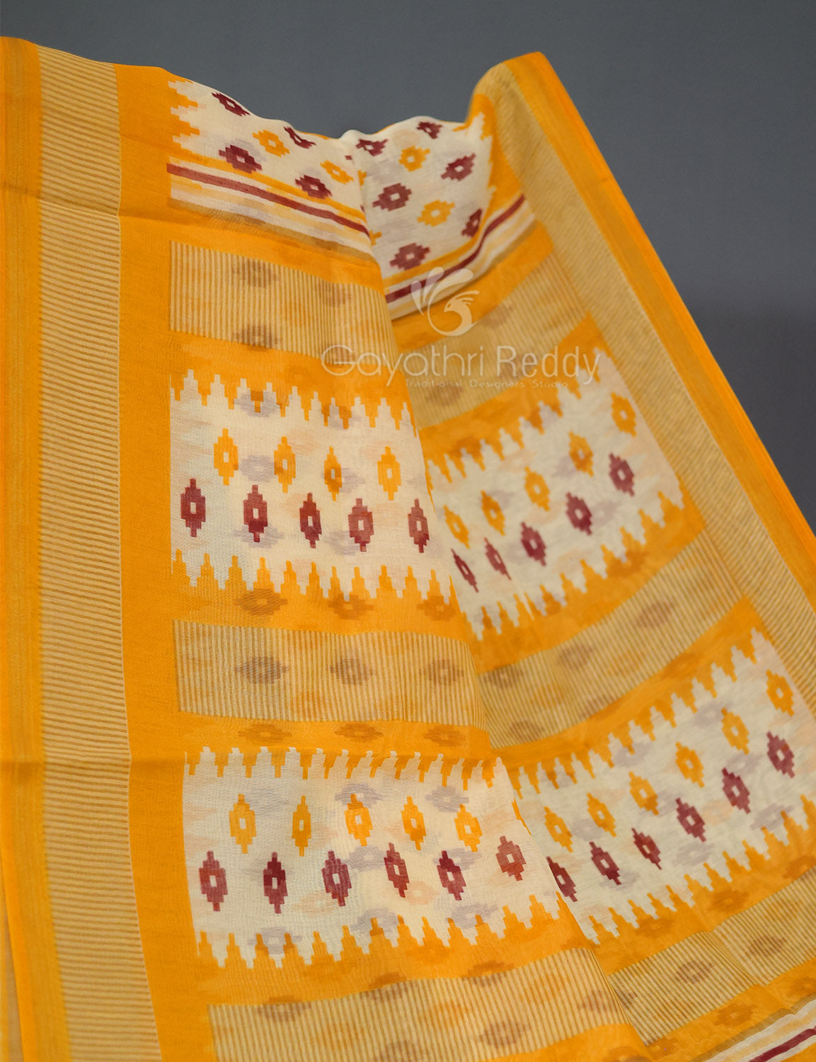Shades of Cream And Light Orange Colour Blouse Patola Print Semi Chanderi Saree By Gayathri Reddy Designer Studio | Swadesiicart