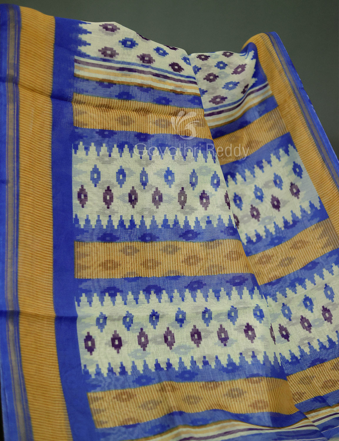 Shades of Cream And Ink Blue Colour Blouse Patola Print Semi Chanderi Saree By Gayathri Reddy Designer Studio | Swadesiicart