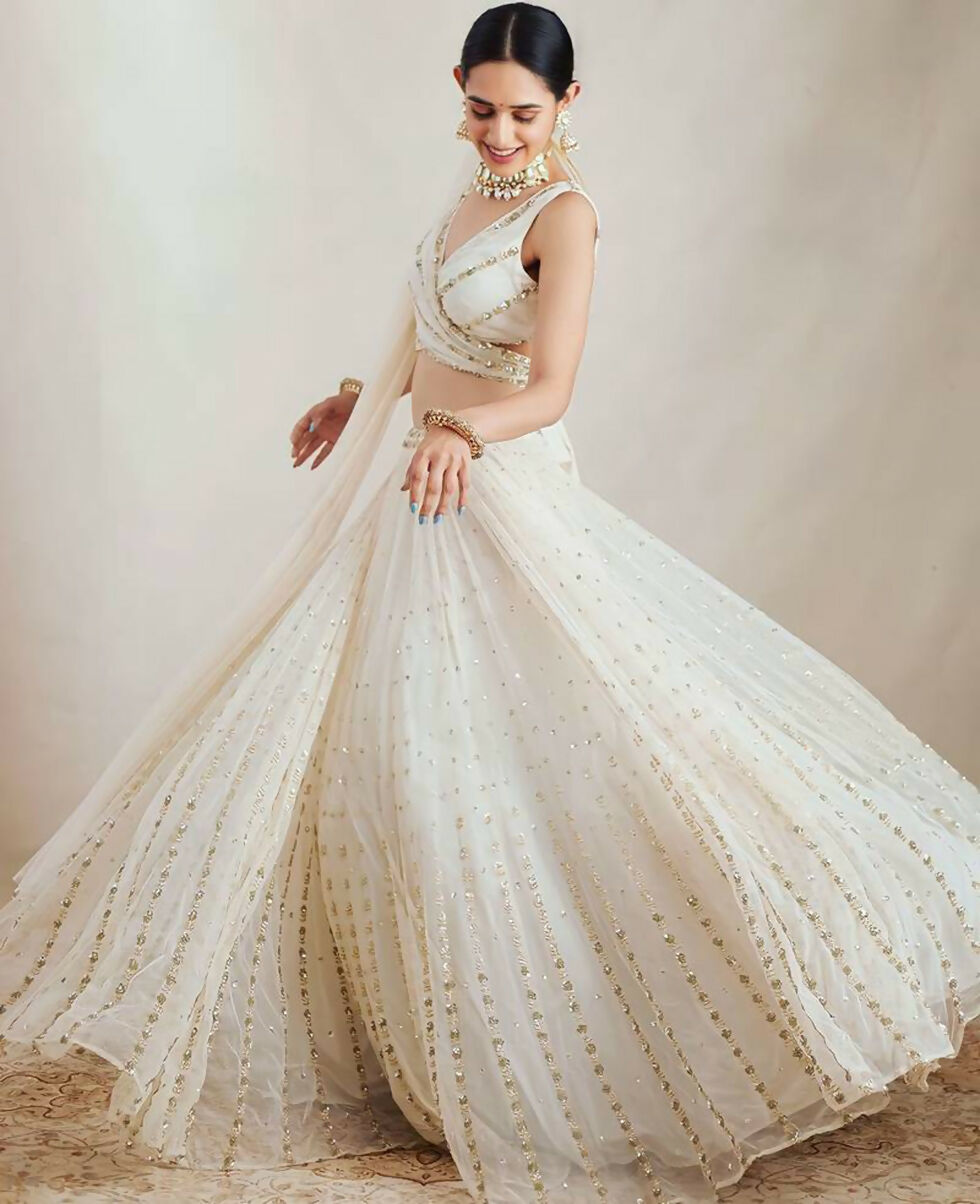 Jyoti Fashion Graceful Off White Sequence With Zari Embroidered Georgette Lehenga Choli with Dupatta | Swadesiicart