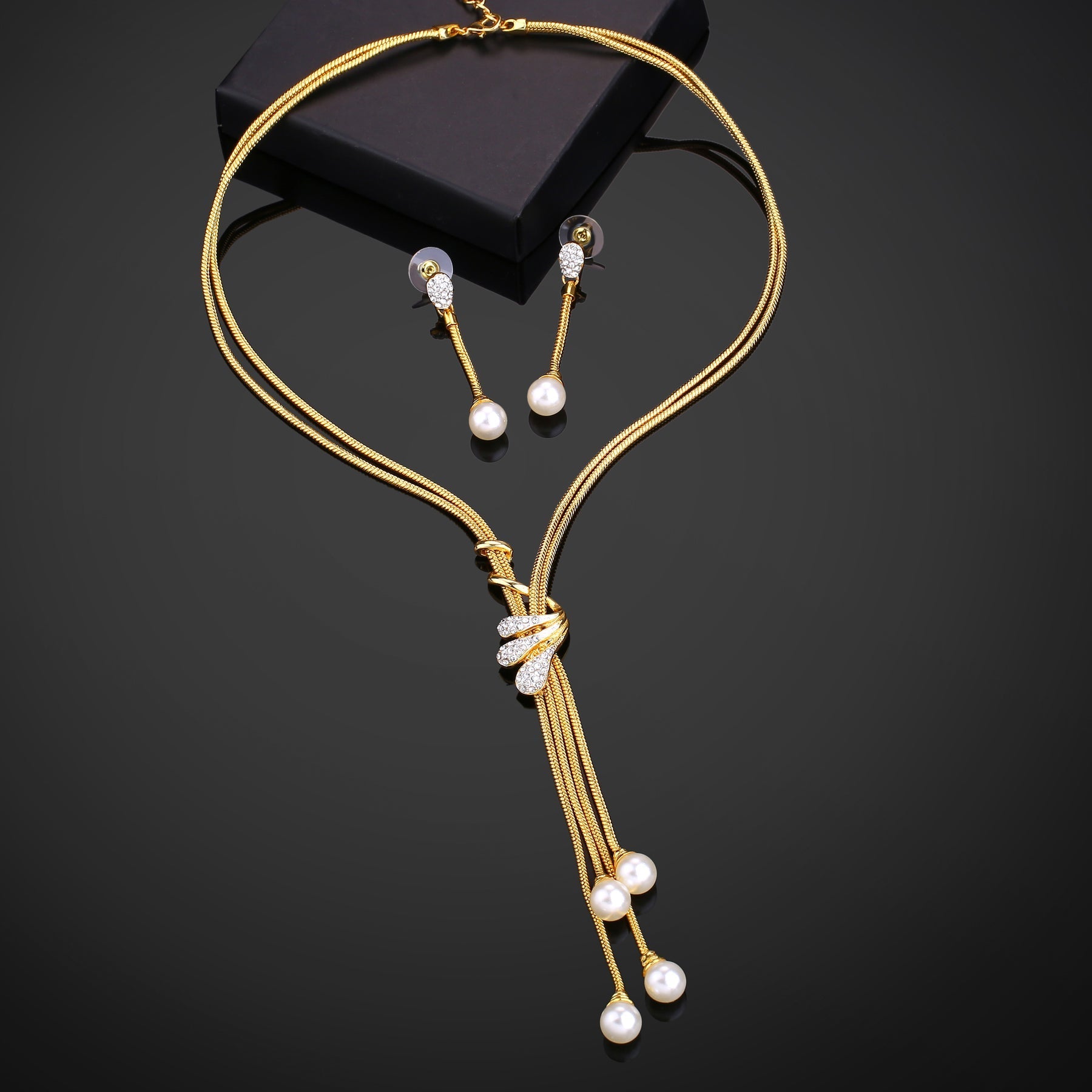 Estele Gold-Polished Trendy Tassel Necklace set with White Pearls for Women - Swadesiicart