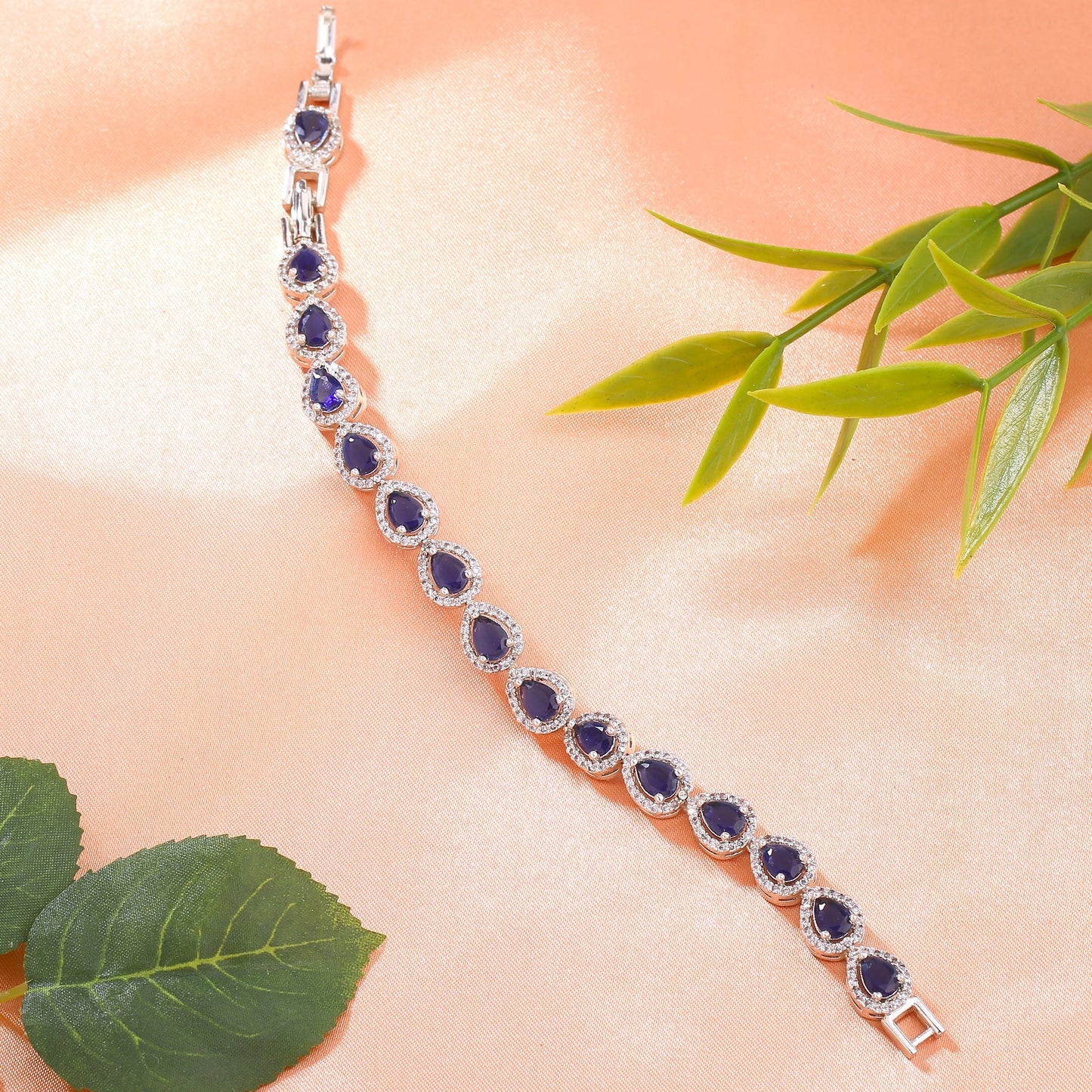 Estele Rhodium Plated CZ Drop Designer Charm Bracelet with Blue American Diamonds for Women - Swadesiicart