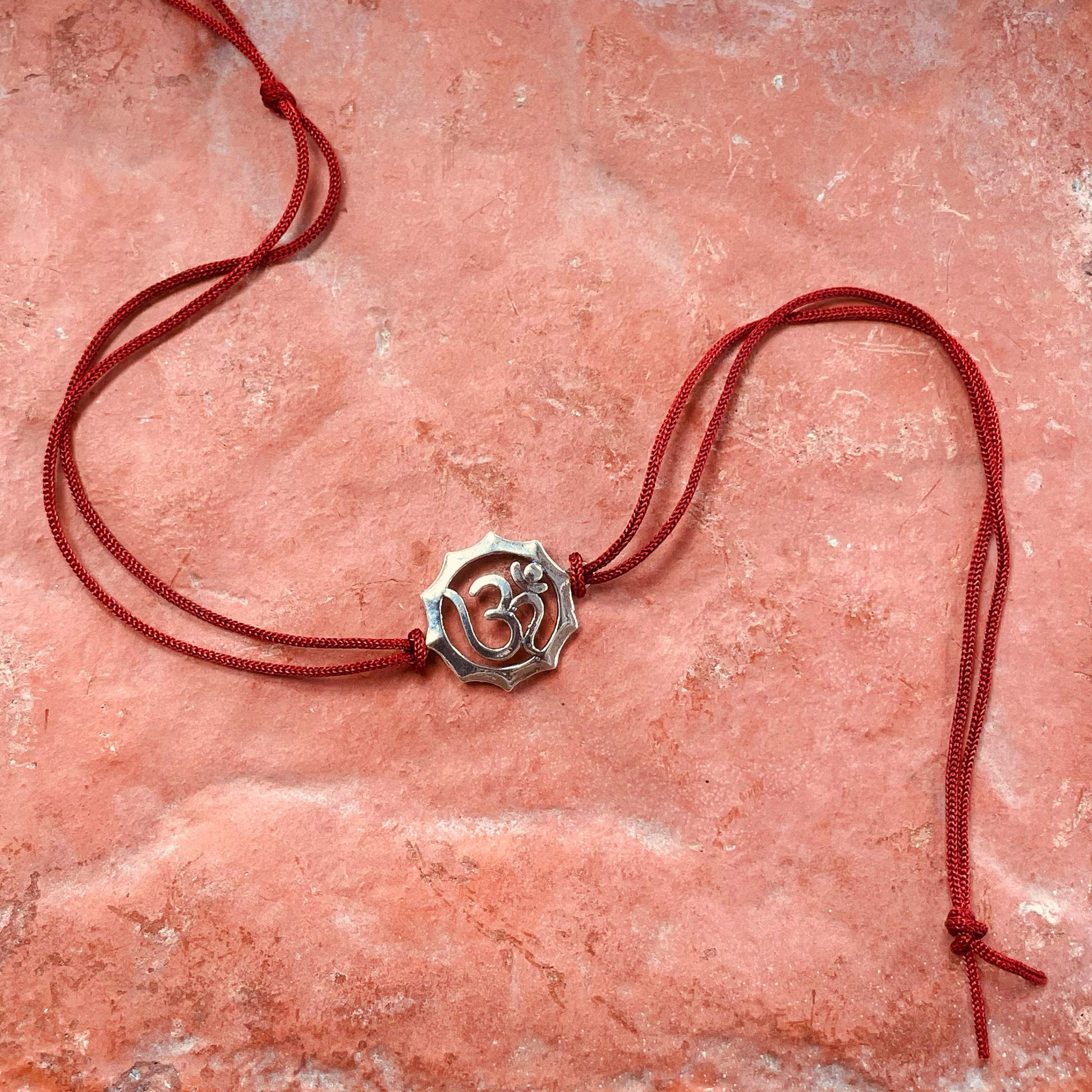 trueBrowns 925 Sterling Silver Embossed Om Thread Rakhi | Swadesiicart