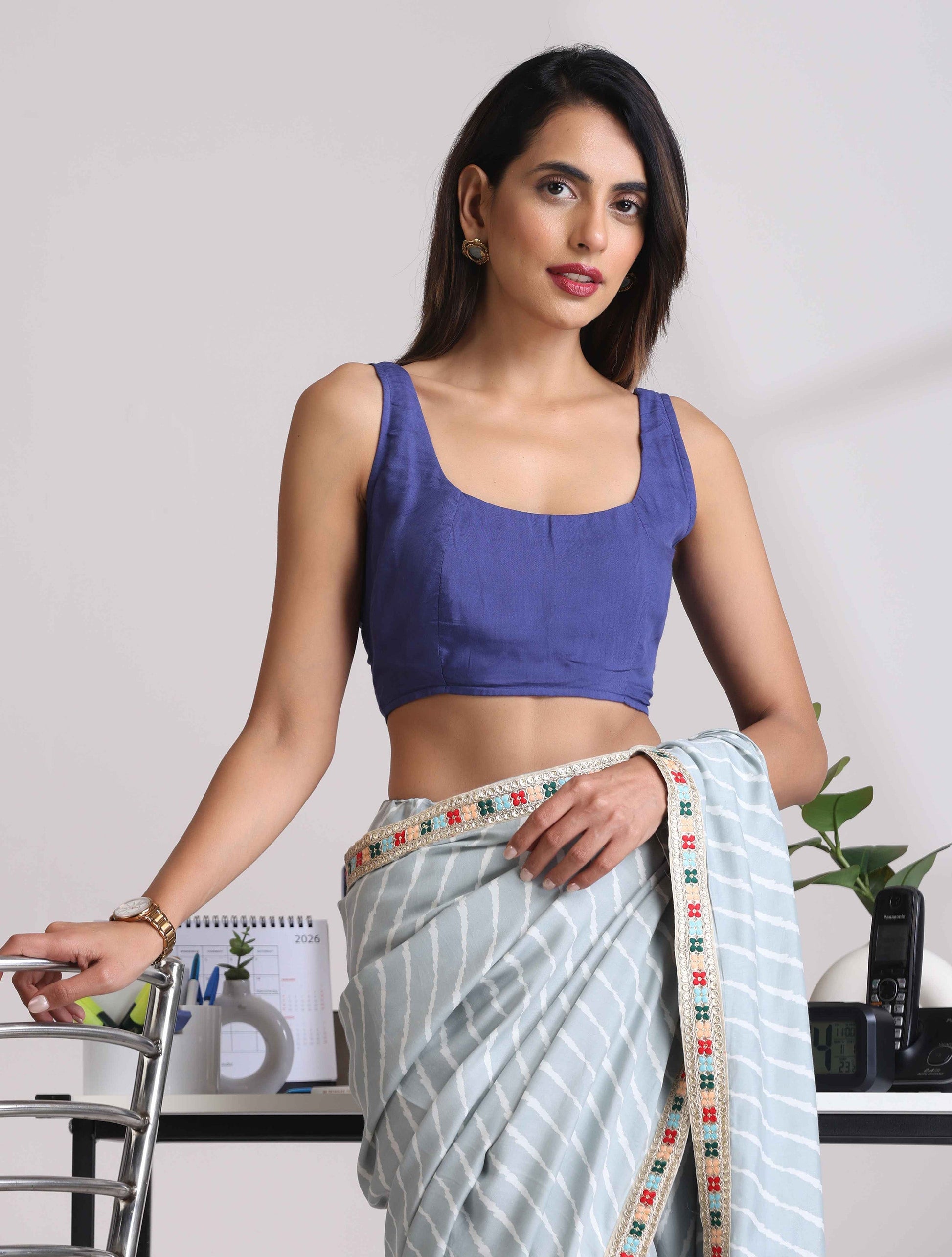 trueBrowns Blue Muslin Solid Sleeveless Blouse | Swadesiicart