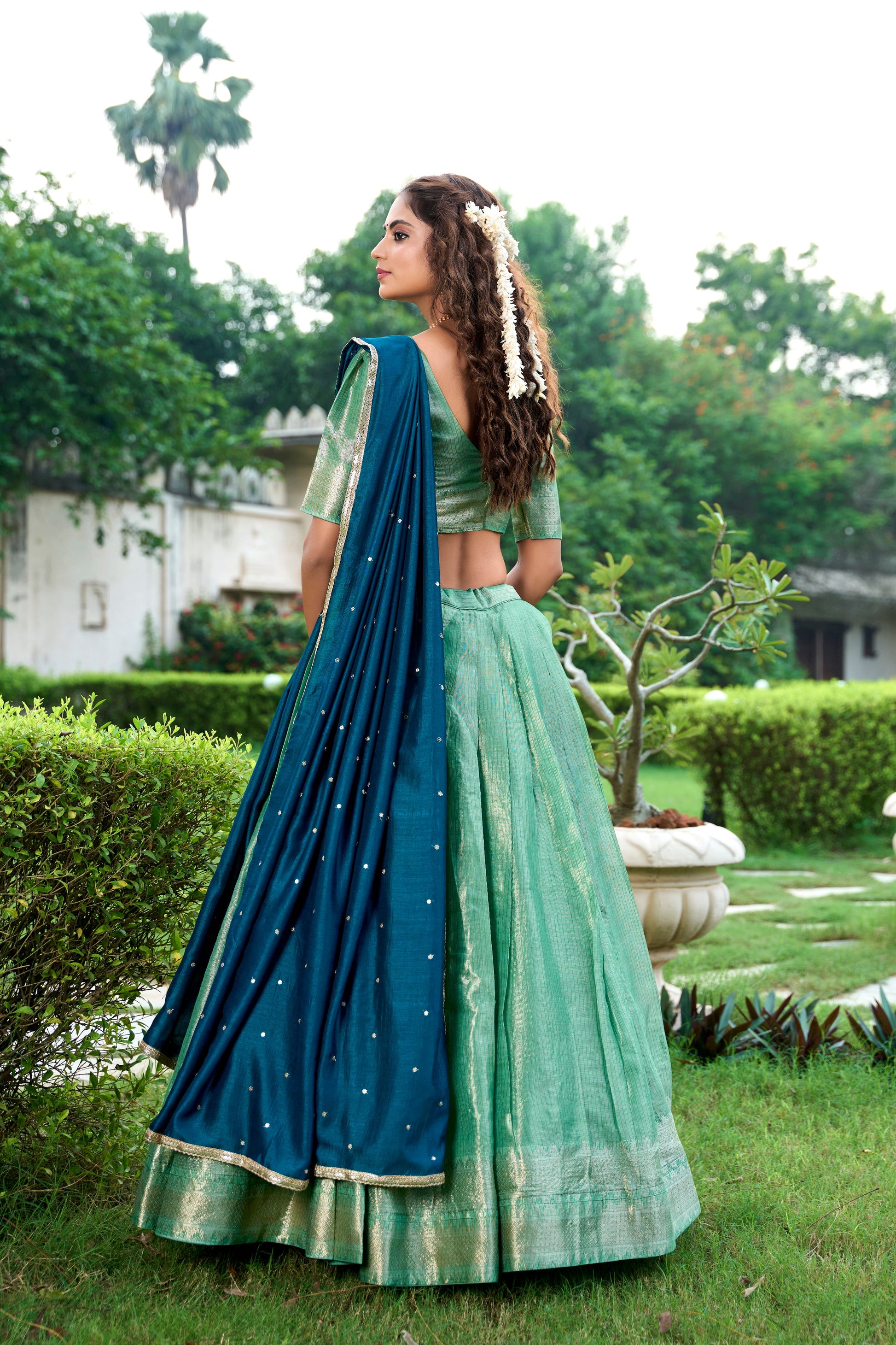 Lorenvalley Pista Kanchipuram Zari Weaving Work Lehenga Choli with Dupatta | Swadesiicart