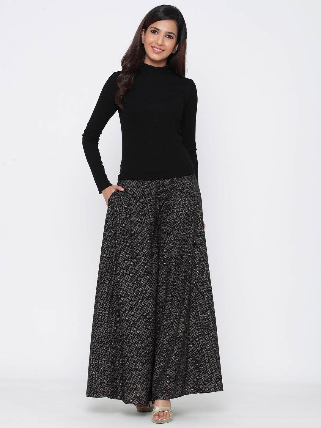 Juniper Women Black Rayon Printed Flared Palazzo | Swadesiicart