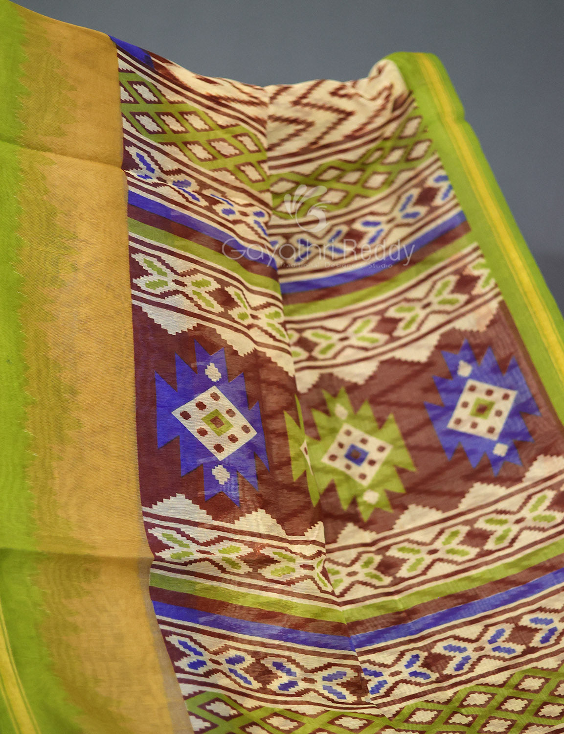 Shades of Cream And Parrot Green Blouse Patola Print Semi Chanderi Saree By Gayathri Reddy Designer Studio | Swadesiicart