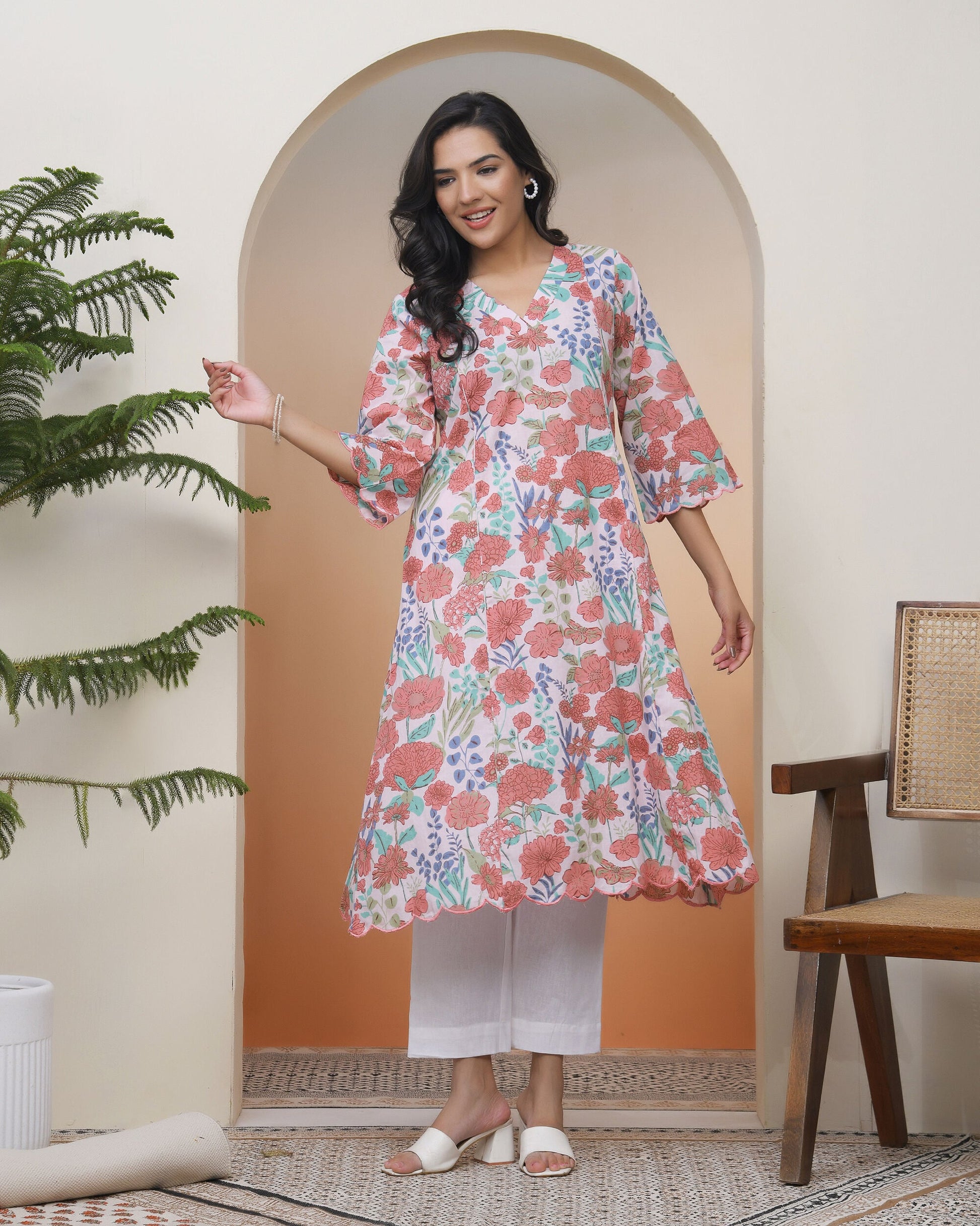 Vaasva Women Peach Floral Cotton Printed Flare Kurti | Swadesiicart