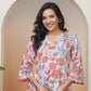 Vaasva Women Peach Floral Cotton Printed Flare Kurti | Swadesiicart