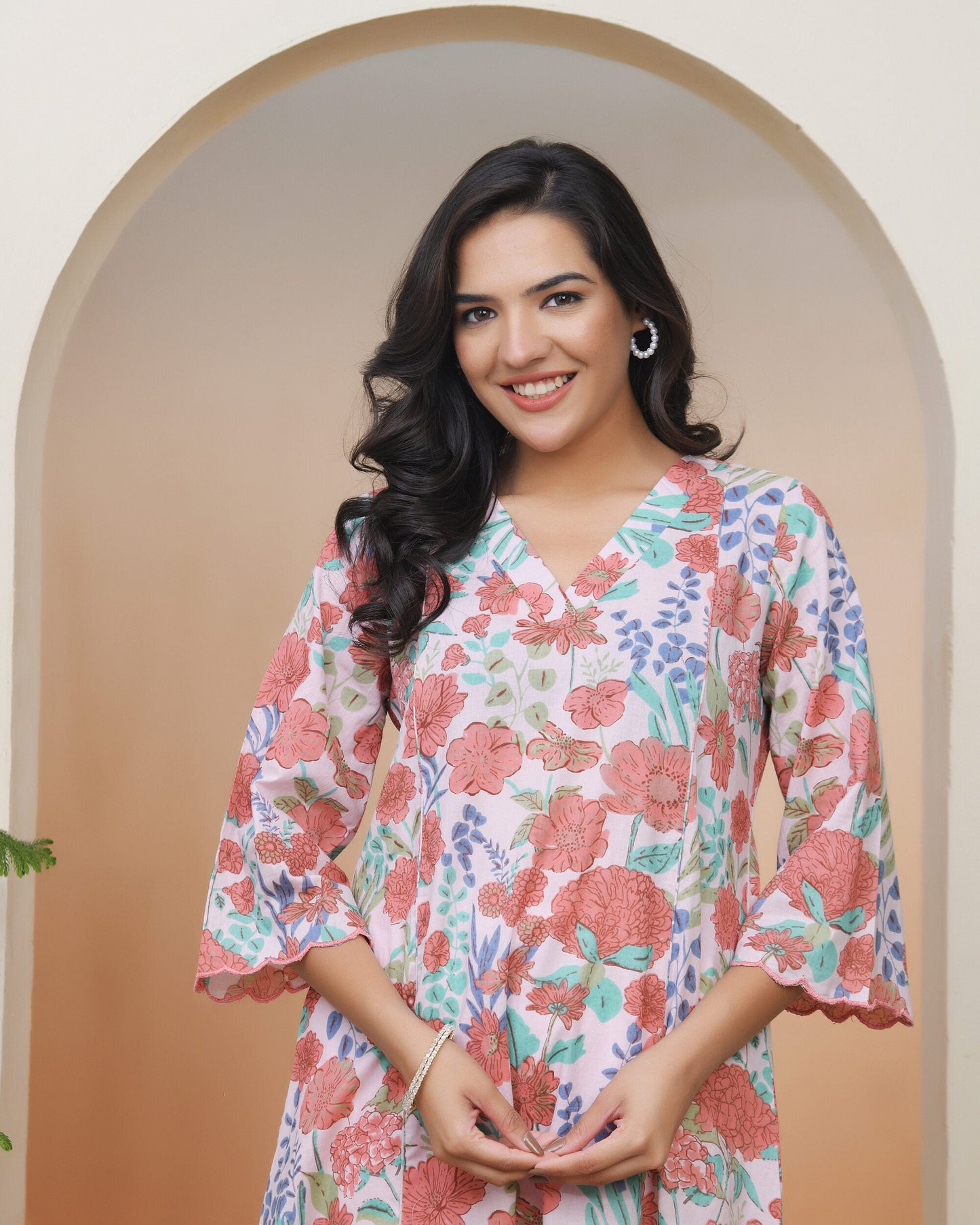 Vaasva Women Peach Floral Cotton Printed Flare Kurti | Swadesiicart