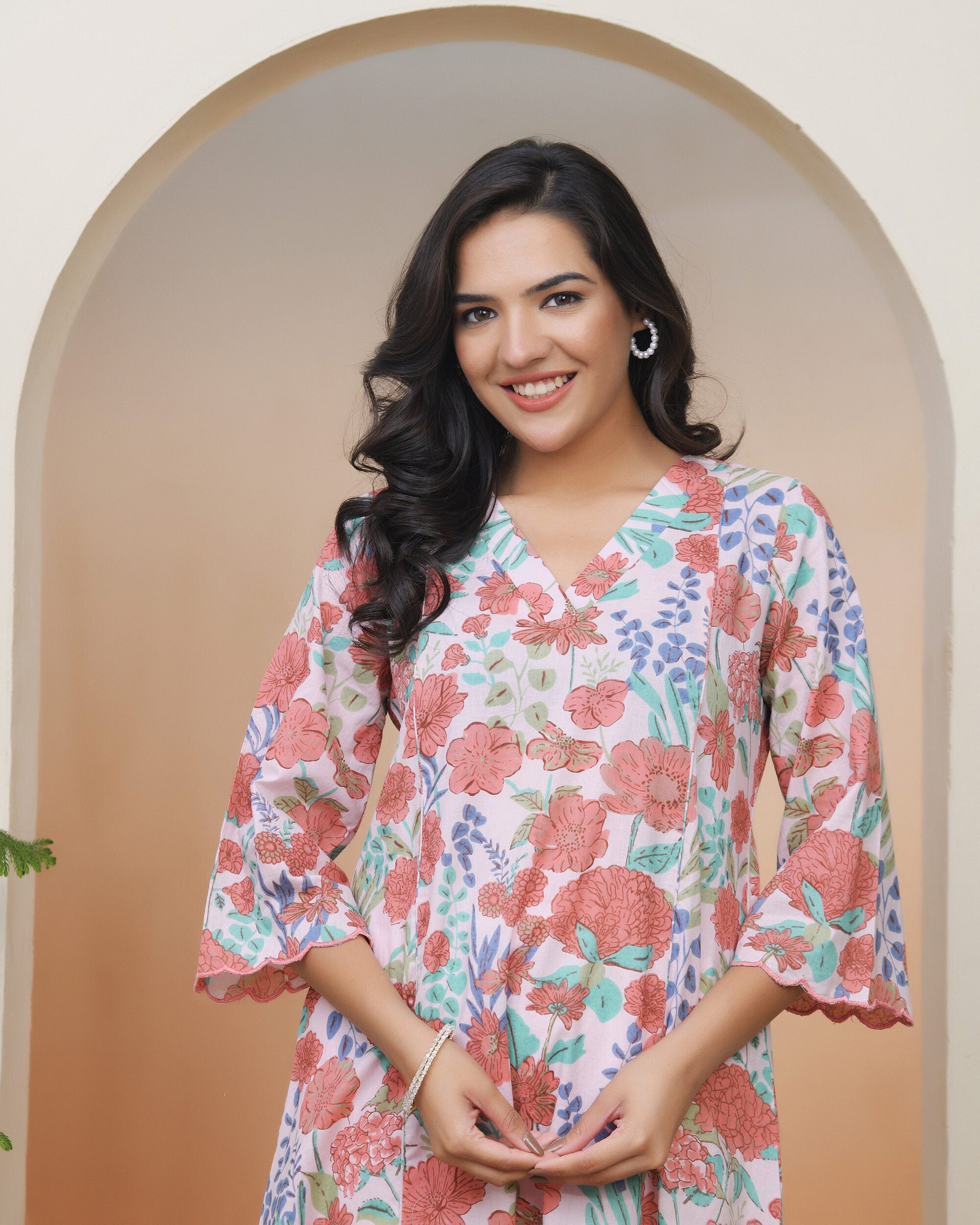 Vaasva Women Peach Floral Cotton Printed Flare Kurti | Swadesiicart