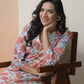 Vaasva Women Peach Floral Cotton Printed Flare Kurti | Swadesiicart