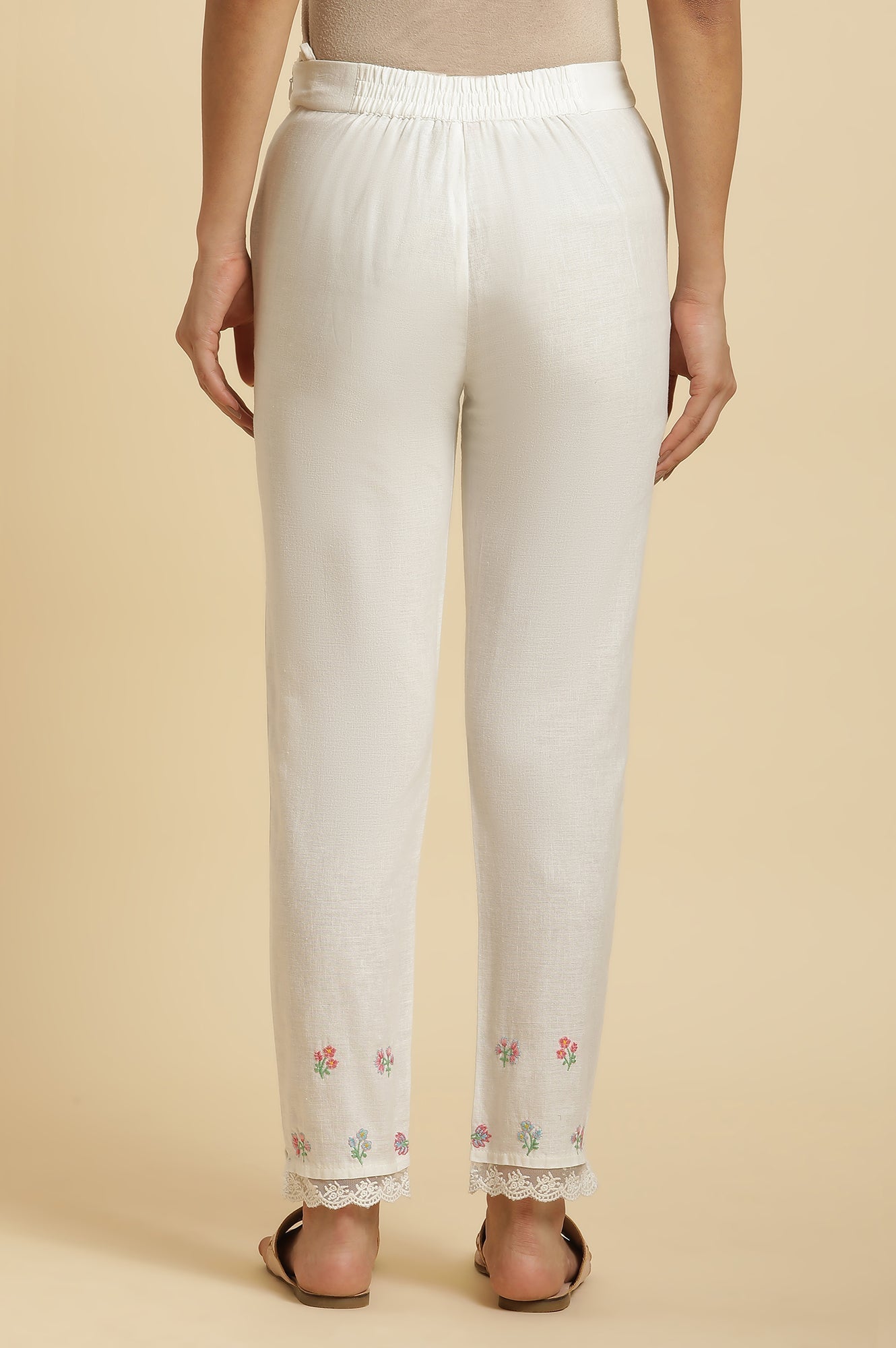 W for Woman White Striped Schiffli Rayon Dobby Straight Kurta and Slim Pant Set