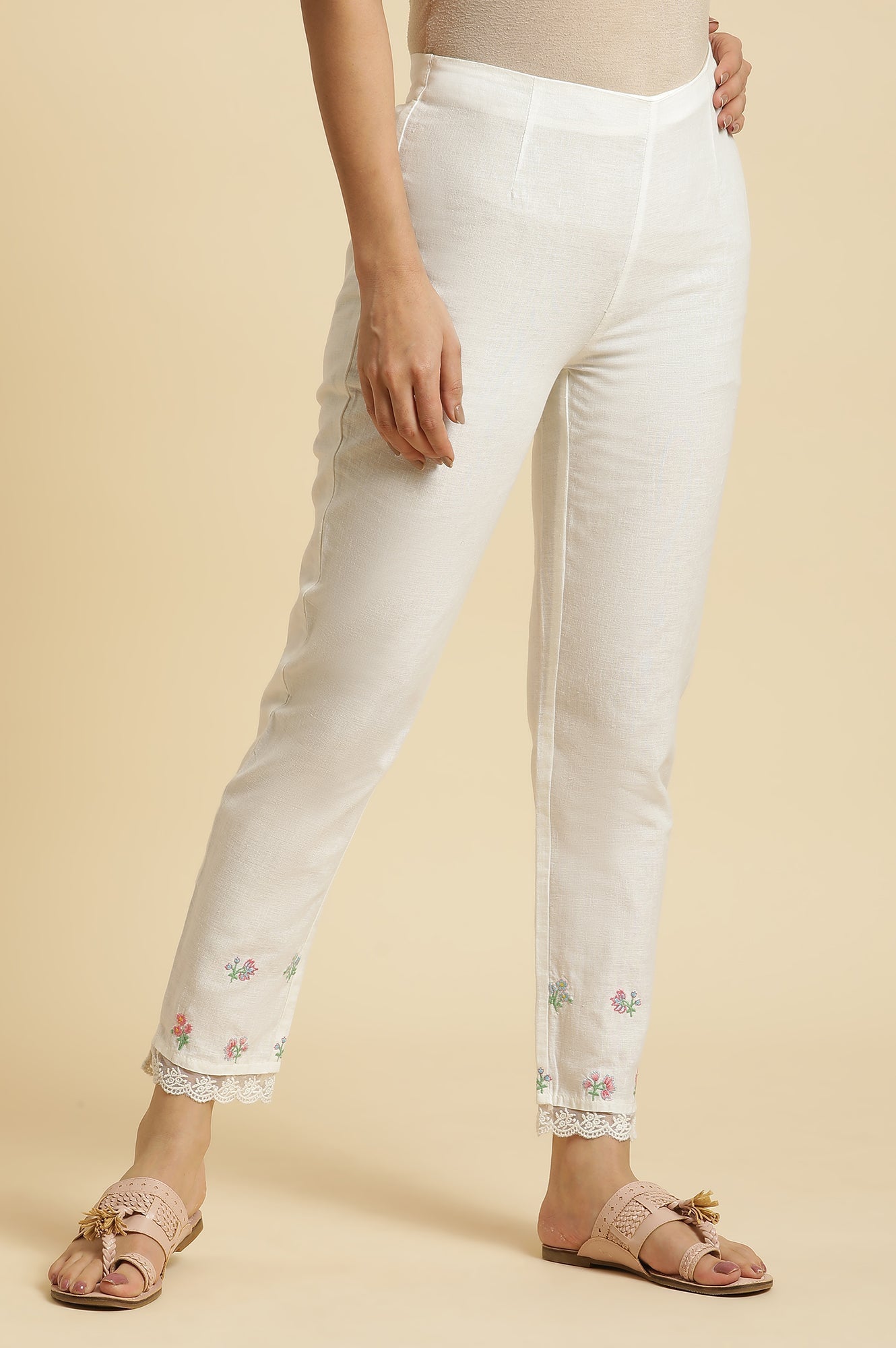 W for Woman White Striped Schiffli Rayon Dobby Straight Kurta and Slim Pant Set
