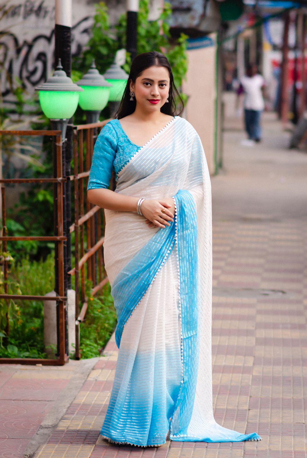 Blue Poly Chiffon Striped Saree with Unstitched Blouse - Hiral Fashion | Swadesiicart