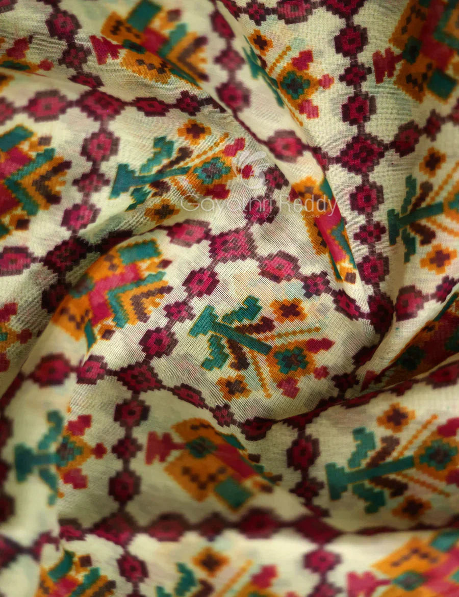 Vibrant Shades of Cream Patola Print Semi Chanderi Saree By Gayathri Reddy Designer Studio | Swadesiicart