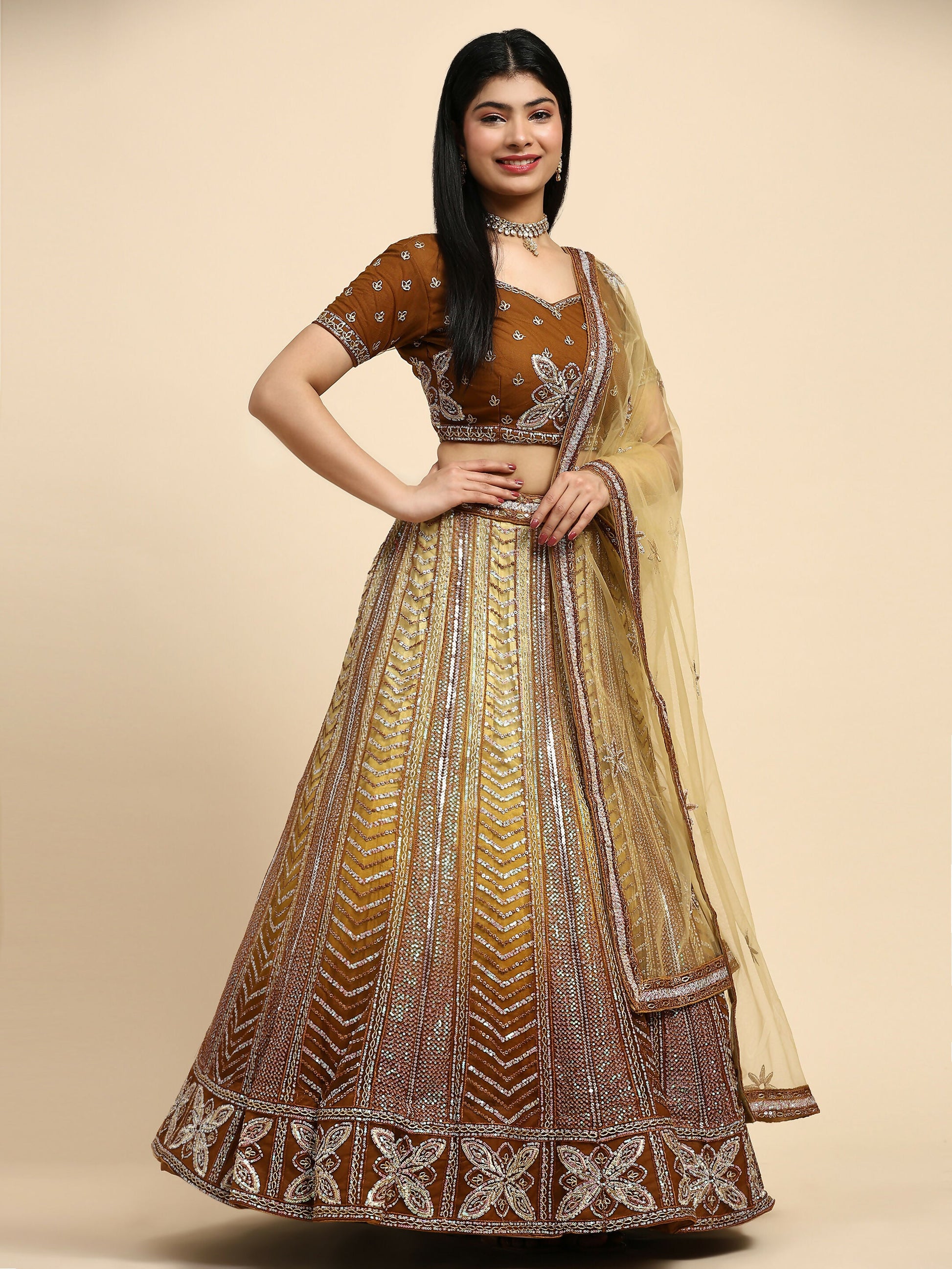 Brown Fancy Net Sequence Embroidered Lehenga Choli with Dupatta - Dhara | Swadesiicart