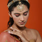Gold-Polished White Kundan-Studded Pearl Beaded Matha Patti - Ruby Raang | Swadesiicart