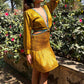 Noroke Yellow silk cut out short dress | Swadesiicart