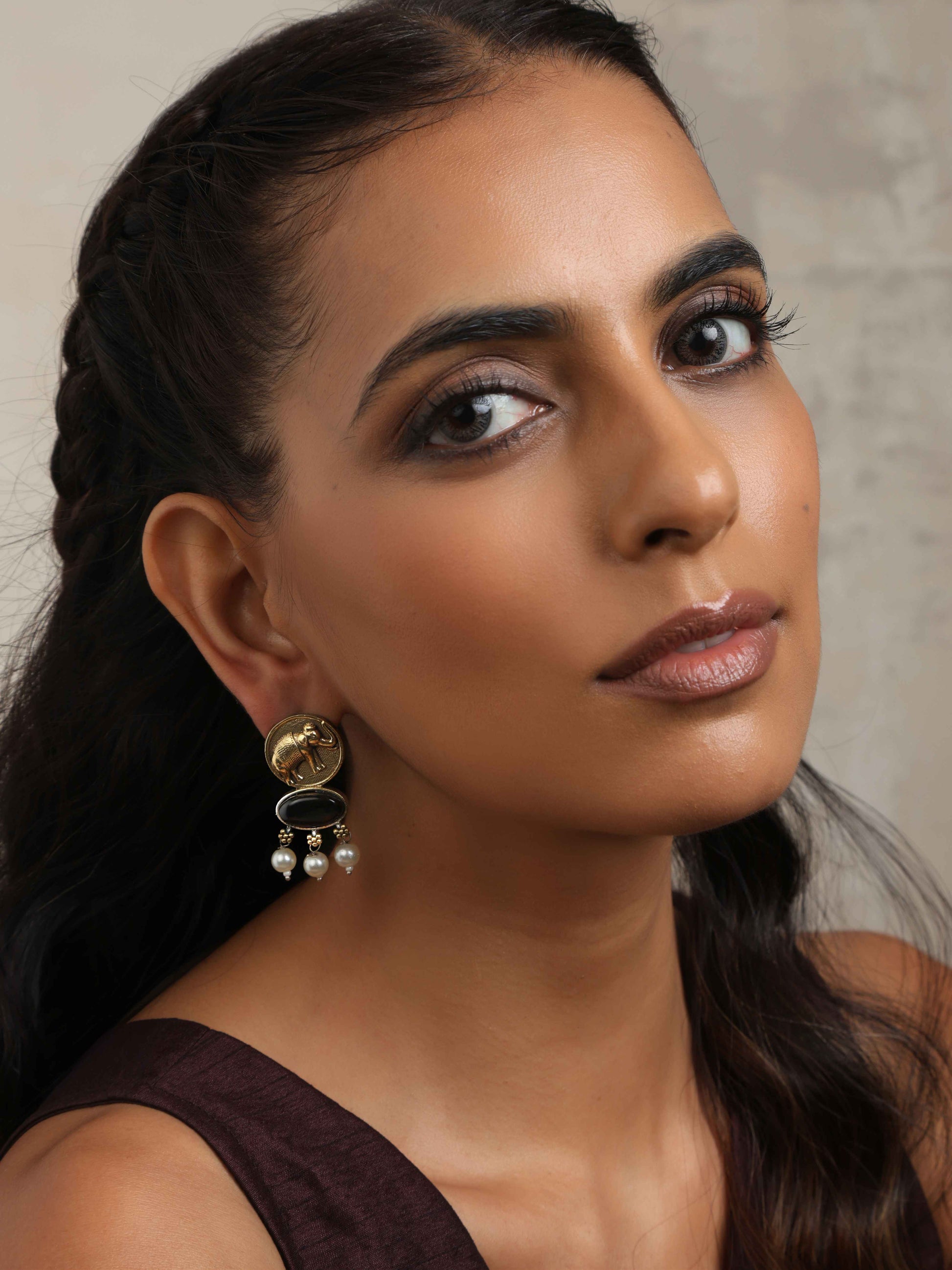 trueBrowns Gold Elephant Embossed Dangle Earrings | Swadesiicart