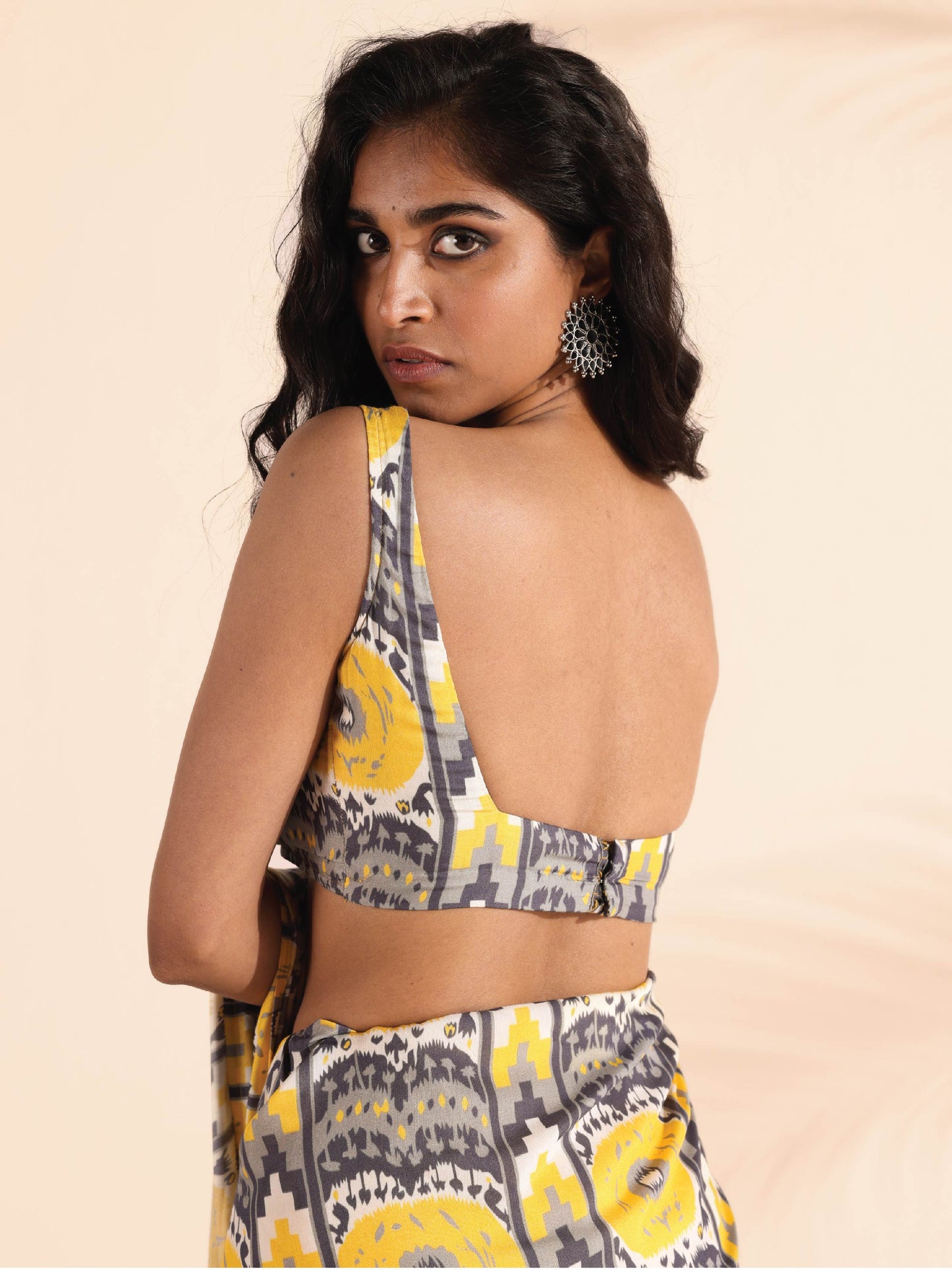 trueBrowns Yellow Muslin Ikat Sleeveless Blouse | Swadesiicart