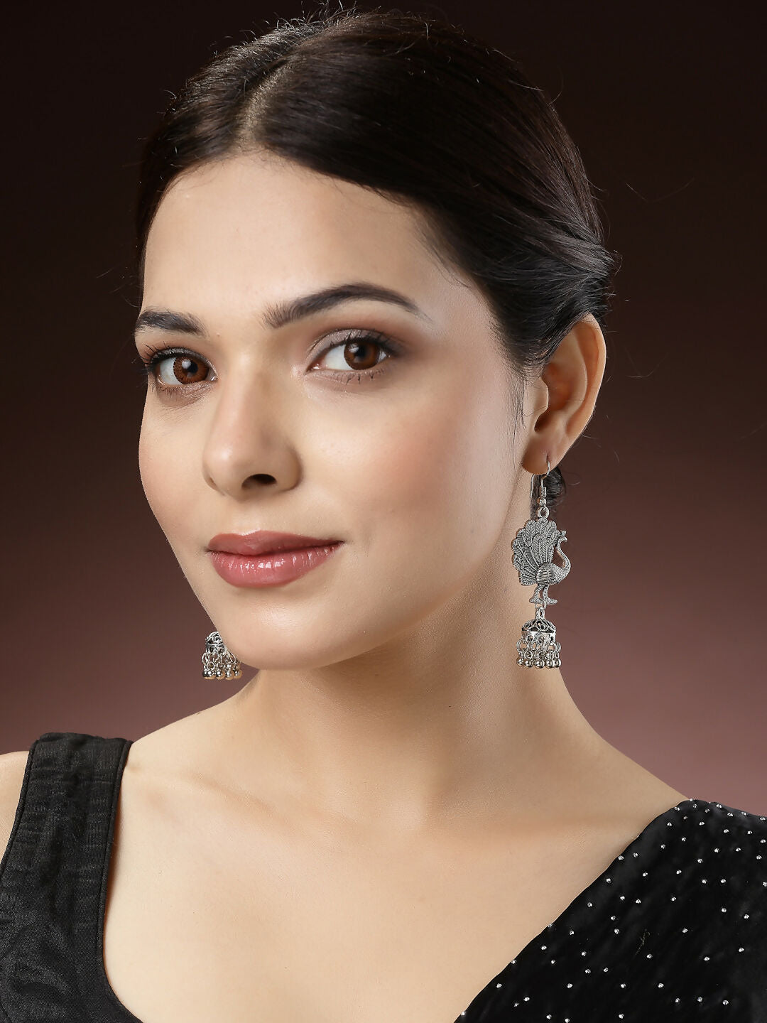 NVR Women's Silver-Toned Peacock Desing German Silver Oxidised Dome Shaped Jhumka Earrings | Swadesiicart