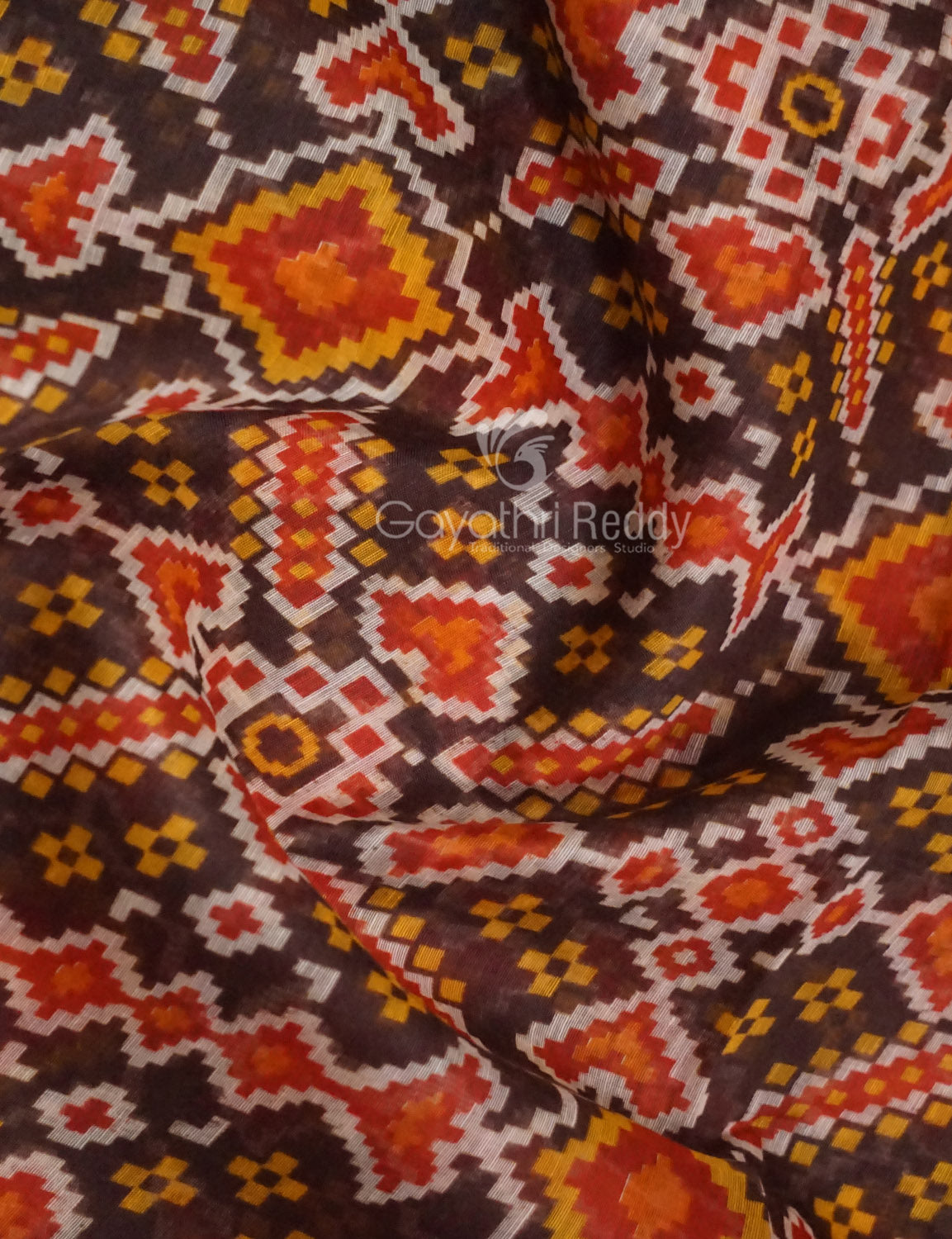 Shades of Brown Colour Patola Print Semi Chanderi Saree By Gayathri Reddy Designer Studio | Swadesiicart