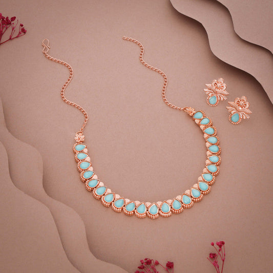 Tehzeeb Creationss Rose Gold Polish Sky Blue Colour Necklace With Pair Of Earrings - Swadesiicart