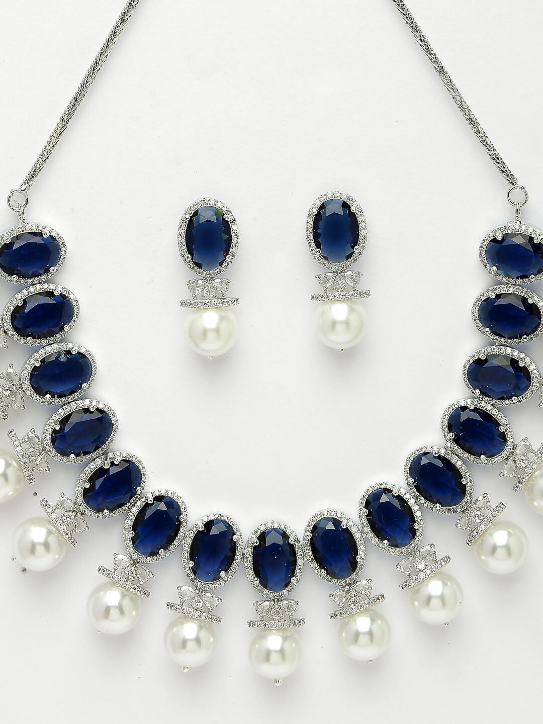 NVR Women's Silver-Plated Blue American Diamond Studded Handcrafted Jewellery Set - Swadesiicart