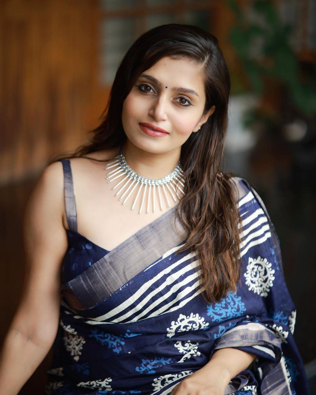 Blue Poly Silk Ethnic Motifs Saree with Unstitched Blouse - Hiral Fashion | Swadesiicart