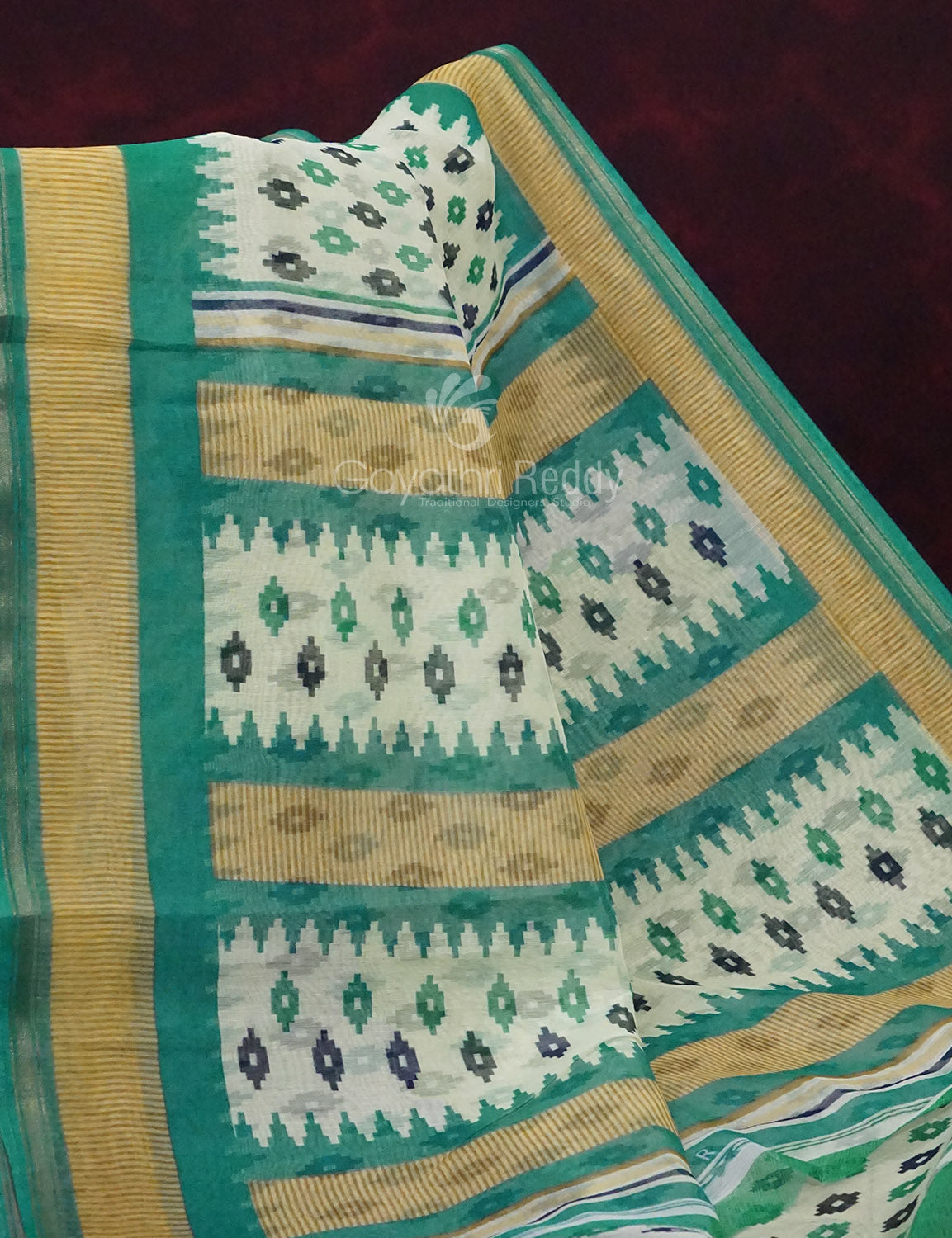 Combo of Off White and Rama Green Patan Patola Semi Chanderi Saree By Gayathri Reddy Designer Studio | Swadesiicart