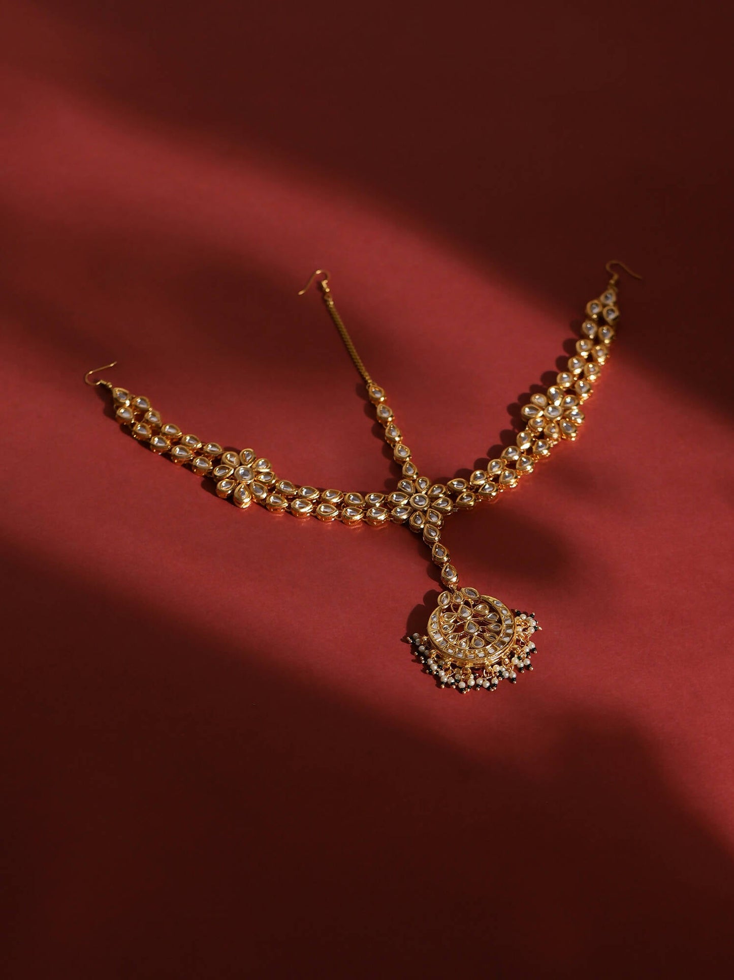 Gold-Polished White Kundan-Studded Pearl Beaded Matha Patti - Ruby Raang | Swadesiicart