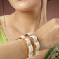 NVR Women's Set of 2 Gold-Polished Pearl Handcrafted Traditional Bangles - Swadesiicart