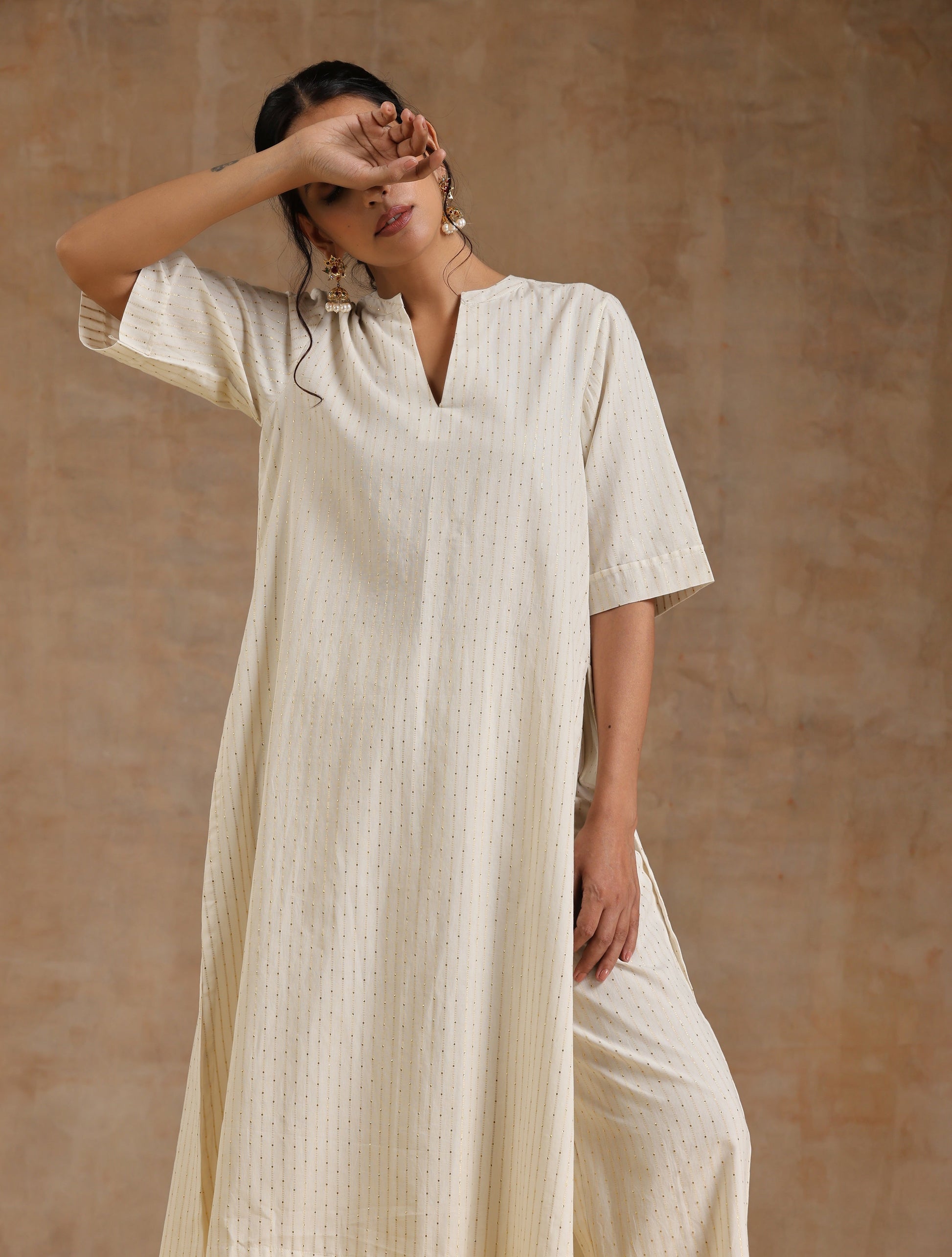 trueBrowns Ivory Gold Cotton Relaxed High-Low Kurta Set | Swadesiicart
