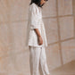 trueBrowns White With Small Floral Booti Print Cotton Pleated Co-Ord Set - Swadesiicart