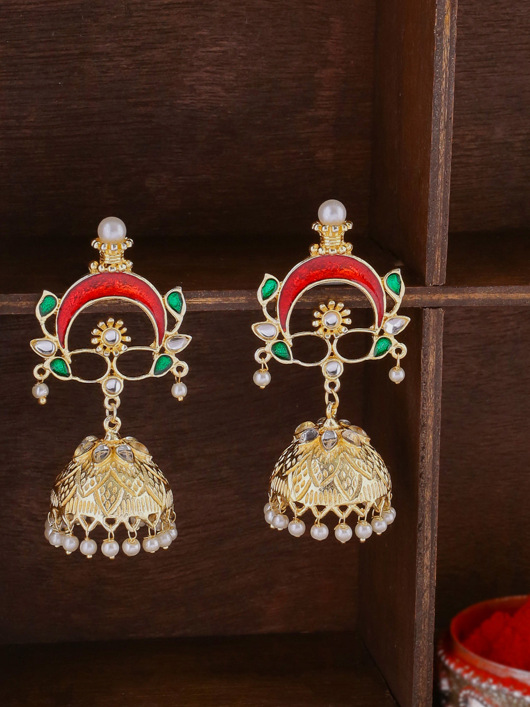 Shoshaa Gold-Polished & Red Enamelled Classic Jhumkas | Swadesiicart