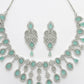 NVR Women's silver plated Turquoise CZ stone handcrafted jewellery set - Swadesiicart