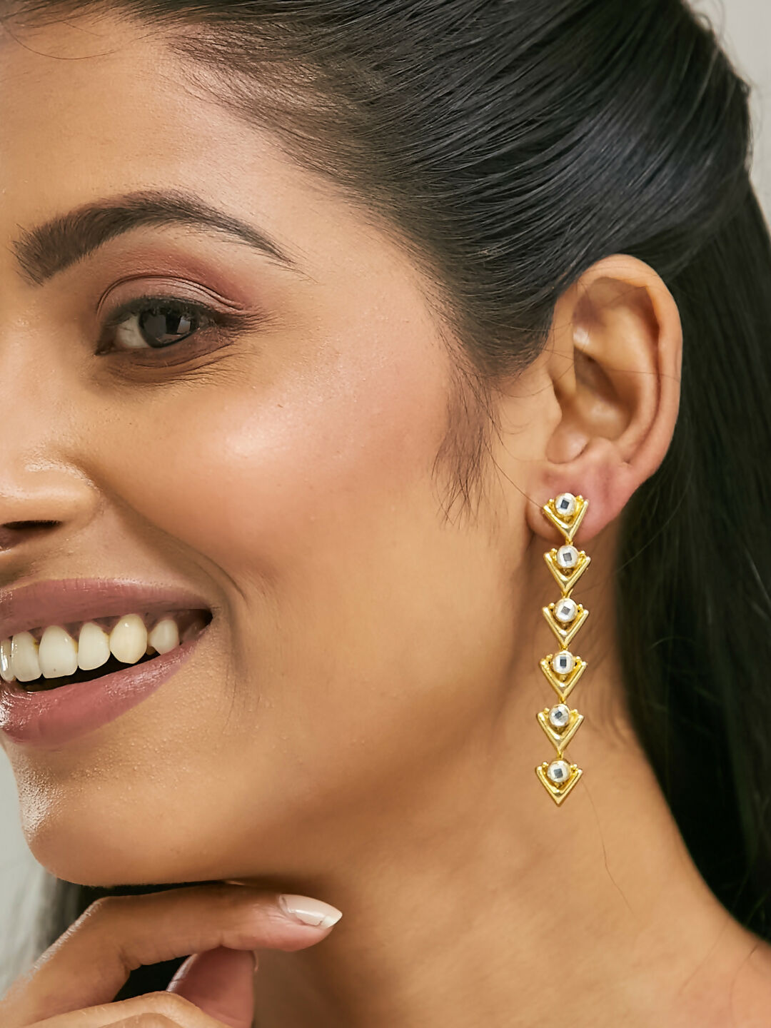 Nuyug 18K Gold-Plated Crystal Stone Studded Triangular Drop Sleek Earrings | Swadesiicart