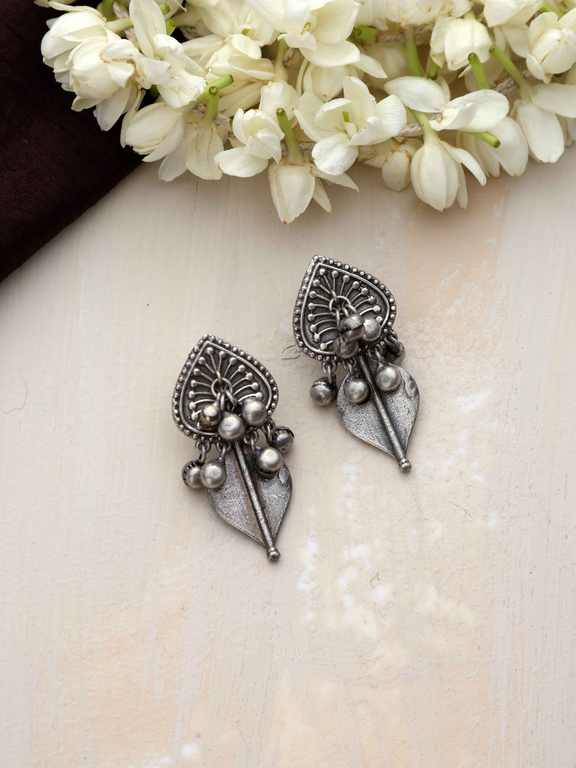 trueBrowns Silver Tone Leaf Stud Earrings - Swadesiicart