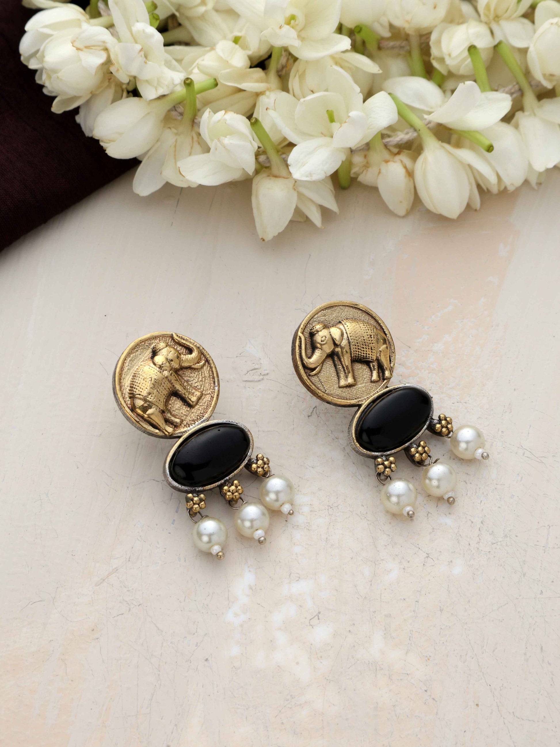trueBrowns Gold Elephant Embossed Dangle Earrings | Swadesiicart