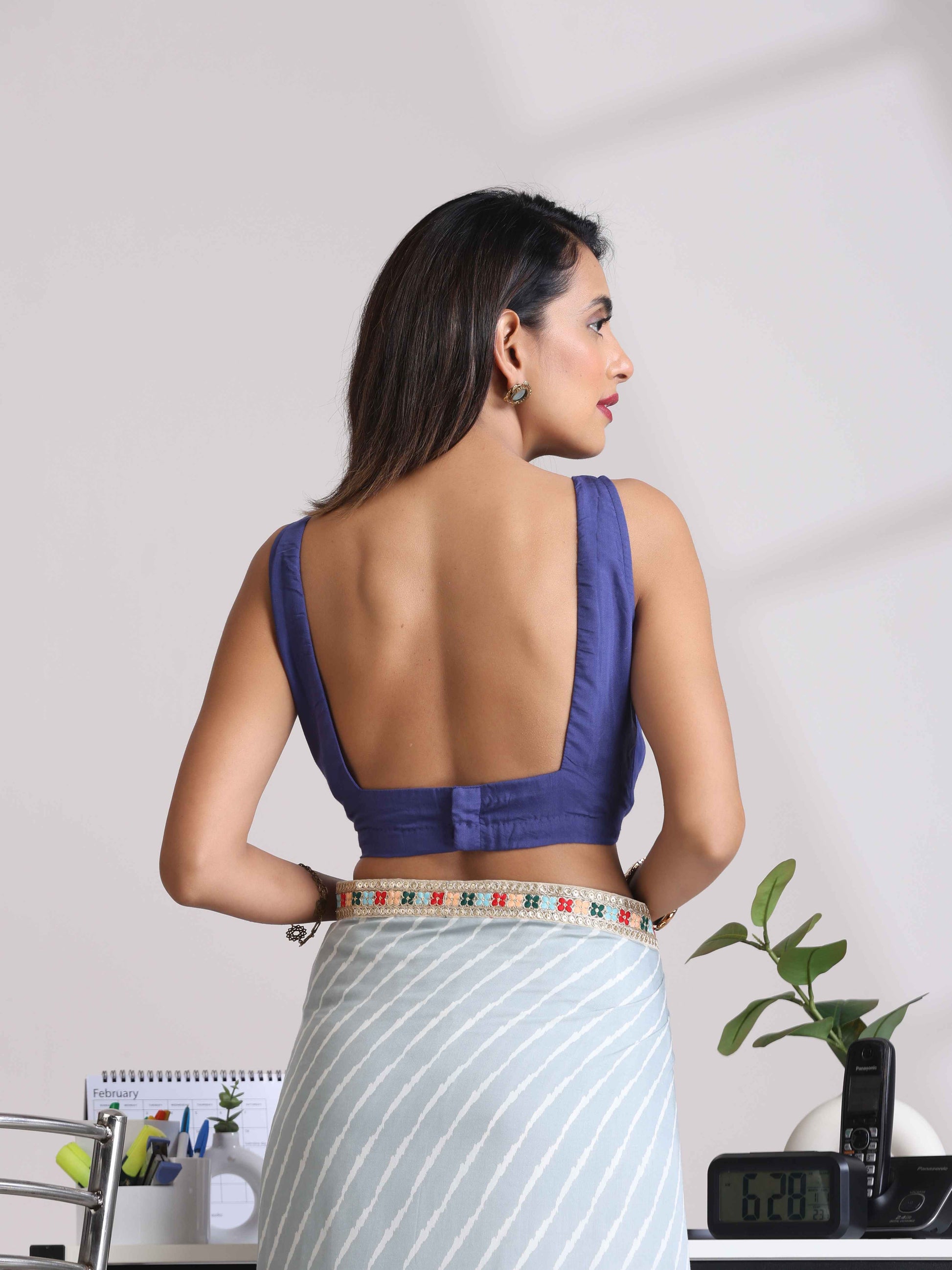 trueBrowns Blue Muslin Solid Sleeveless Blouse | Swadesiicart