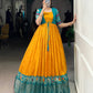 Lorenvalley Fashion Mustard Tussar Chex Patola Print With Weaving Work Border Gown with Koti | Swadesiicart