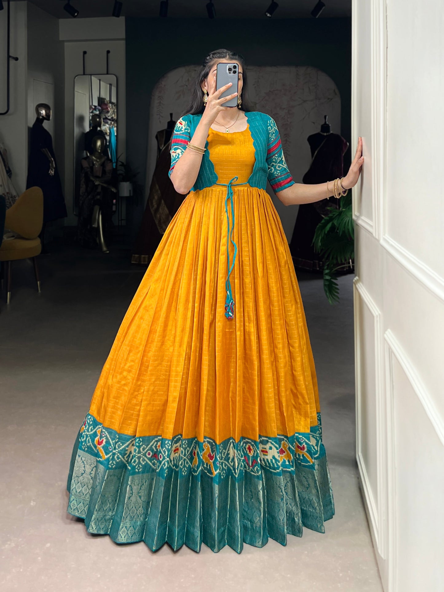 Lorenvalley Fashion Mustard Tussar Chex Patola Print With Weaving Work Border Gown with Koti | Swadesiicart