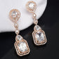 Yellow Chimes Rhodium-Plated Rose-Gold White AD-Studded Drop Earrings | Swadesiicart